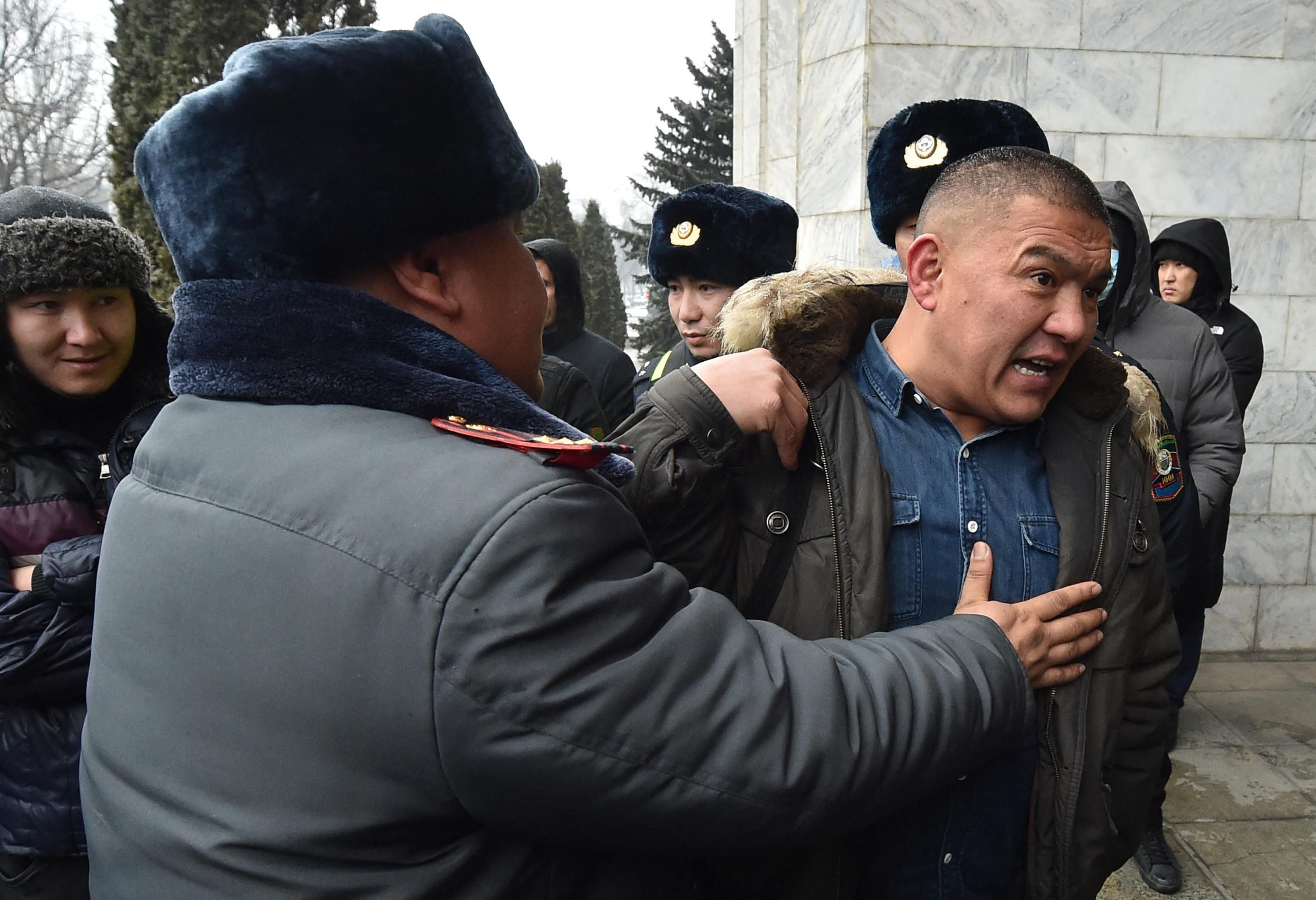 A protester is detained in Kazakhstan