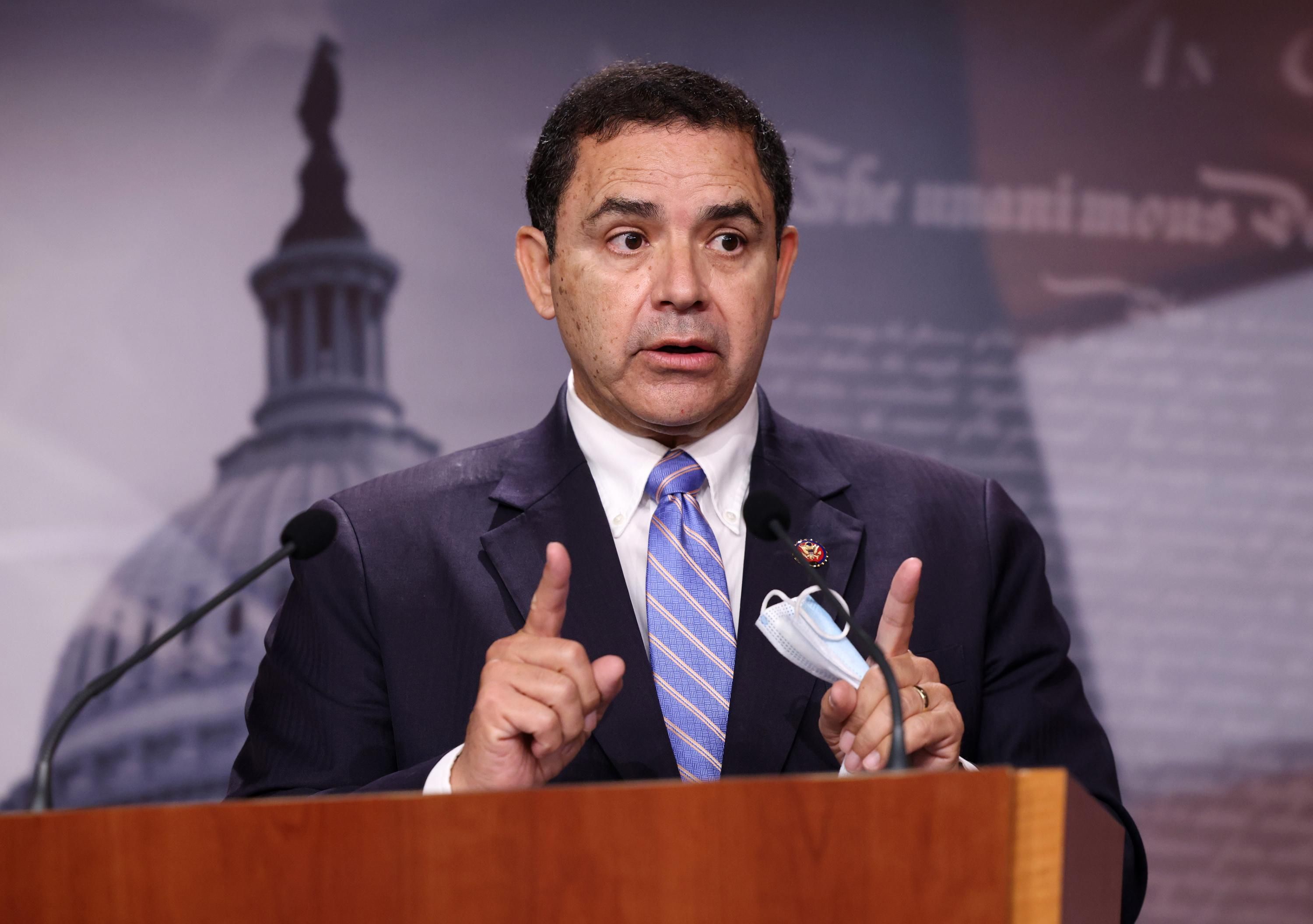 Rep. Henry Cuellar speaks during a news conference