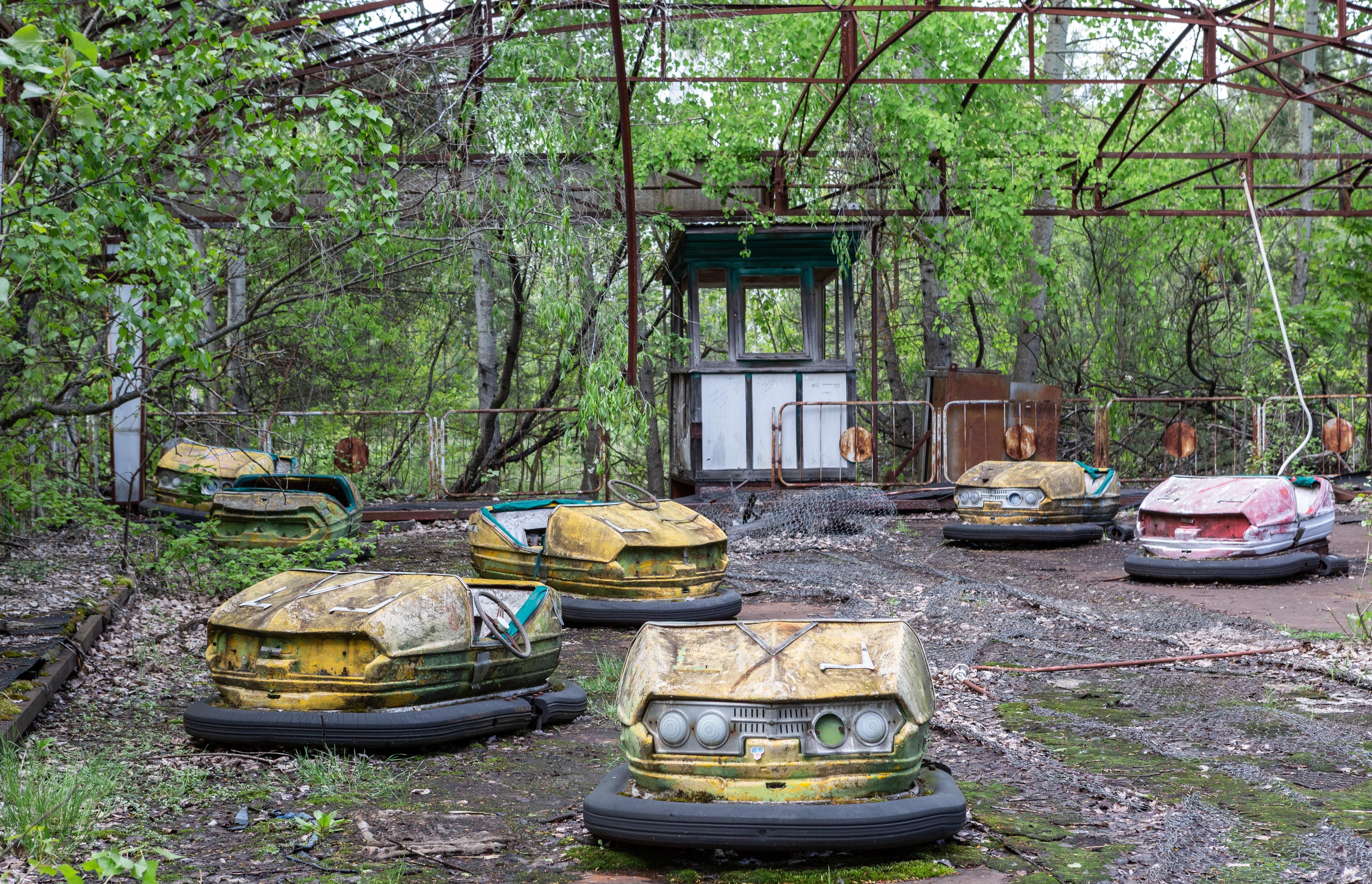 Abandoned bumper cars full of rust sit in an amusement park in the ghost city of Pripyat, Ukraine, which was evacuated on the afternoon of April 27, 1986, 36 hours after the Chernobyl Nuclear Power Plant disaster.