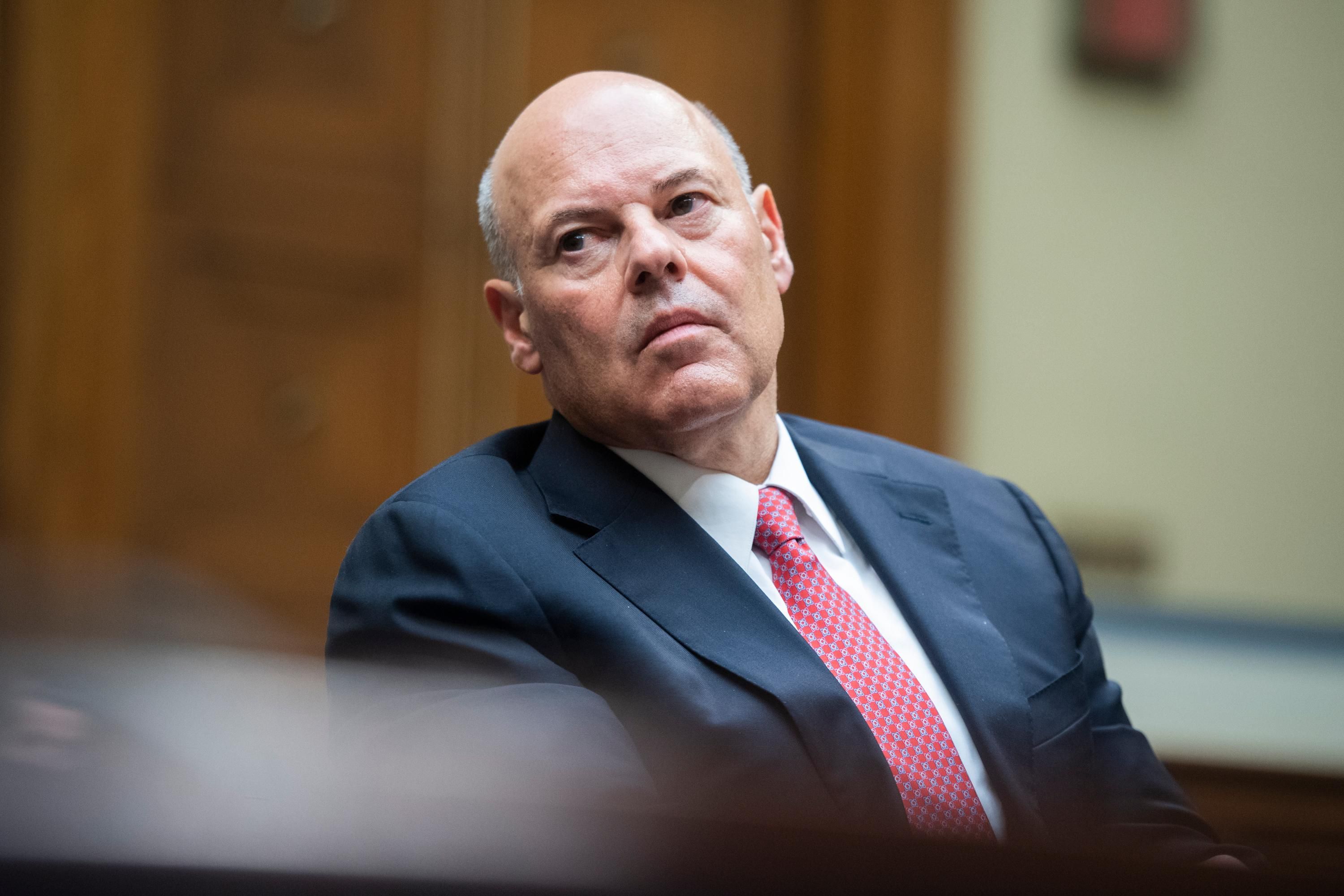 Postmaster General Louis DeJoy appears at a hearing