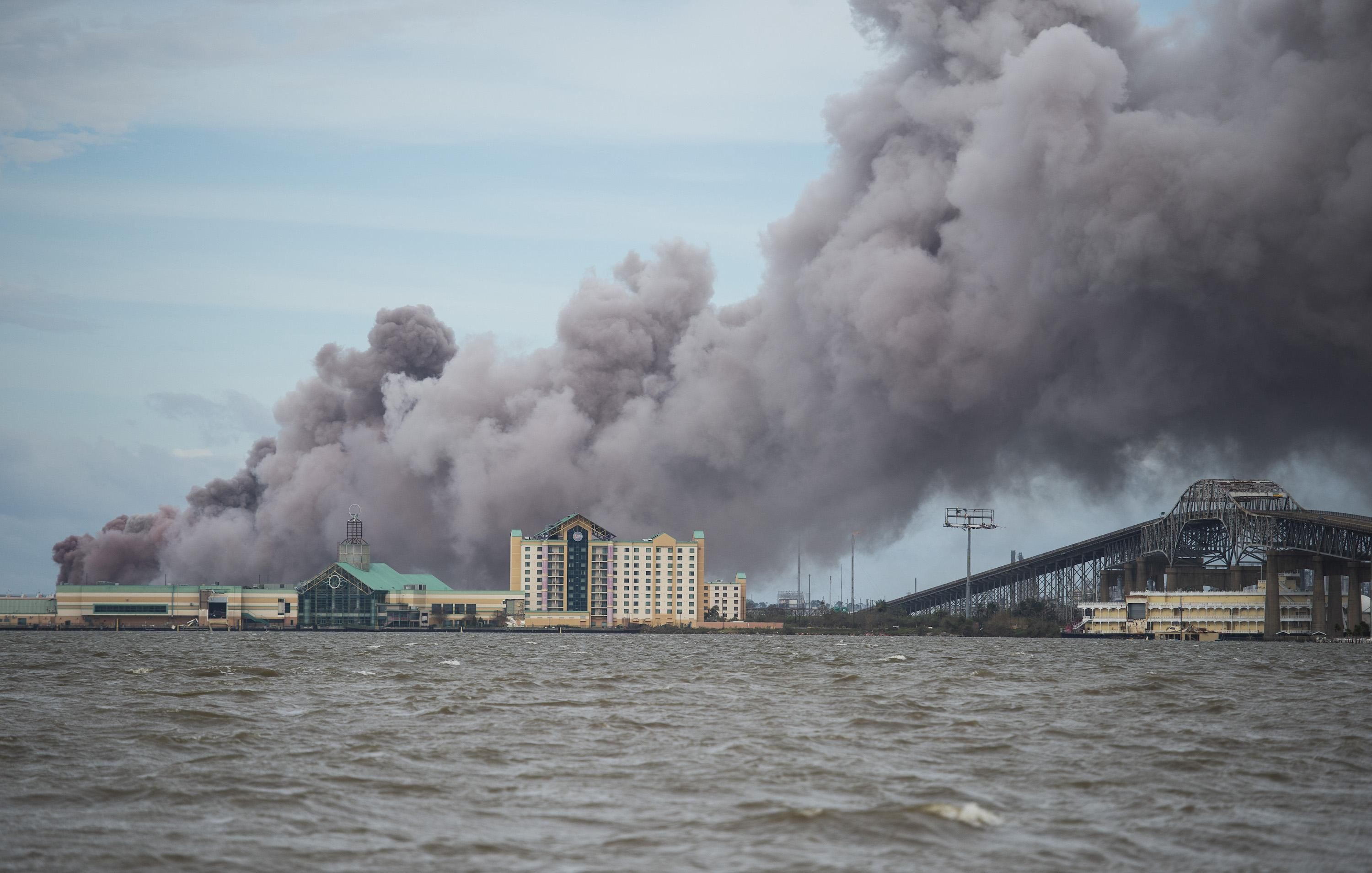 Smoke rises from a burning chemical plant after the passing of Hurricane Laura in Lake Charles, Louisiana on August 27, 2020.