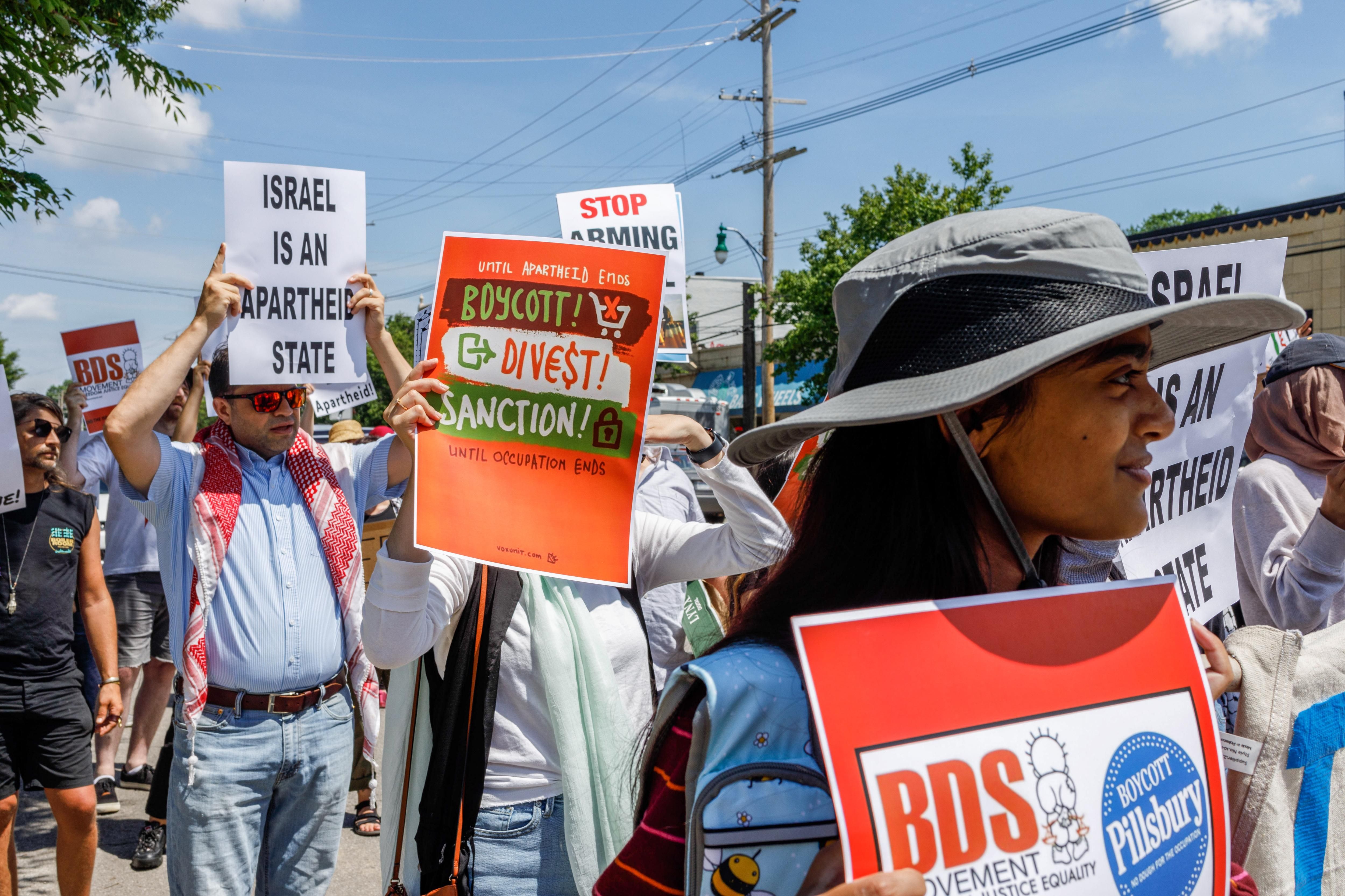 People gather in Columbus, Ohio on June 12, 2021, to protest the Israeli occupation of Palestine and call for boycotting companies that support Israel's apartheid regime.