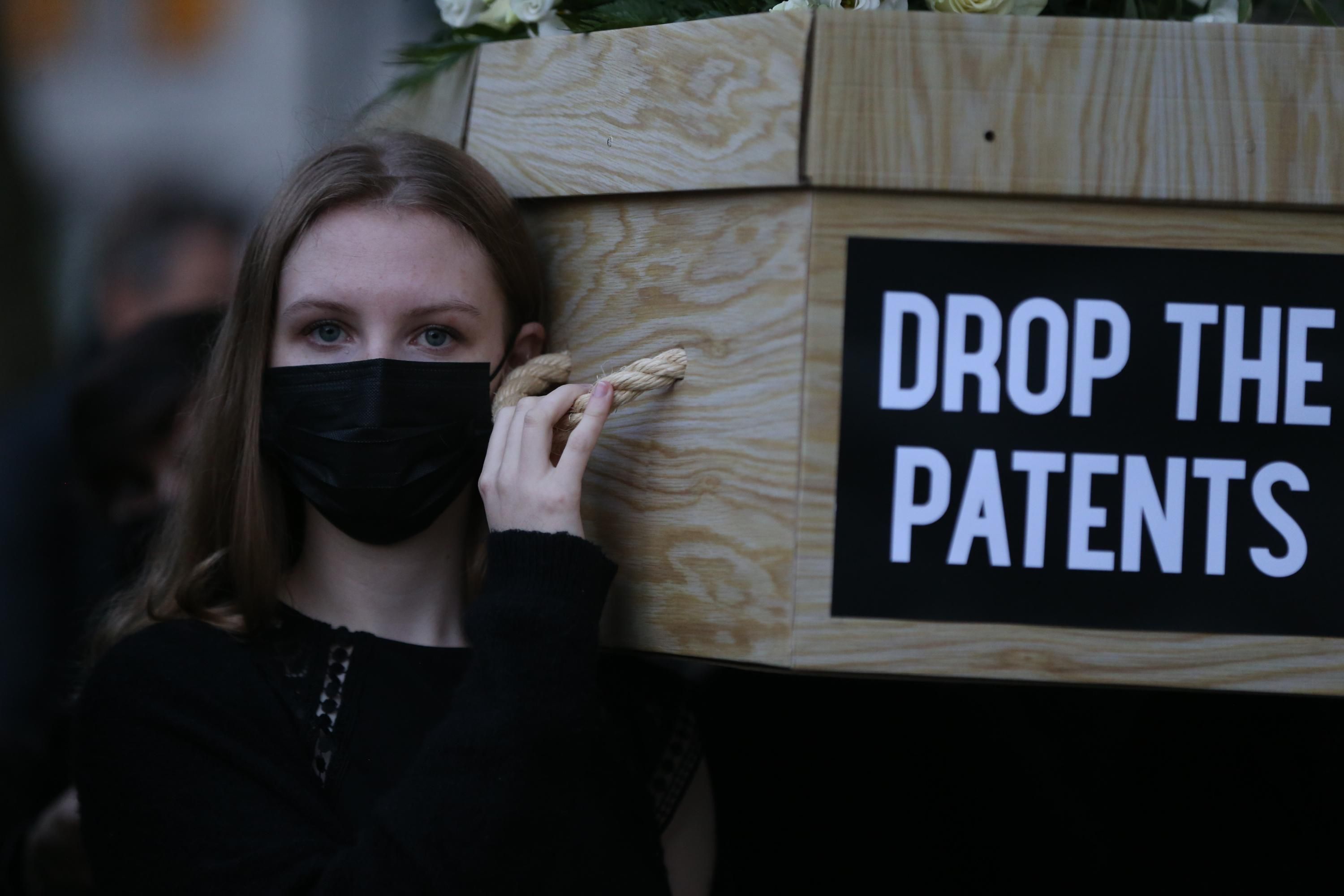 Protesters carry mock coffins in London