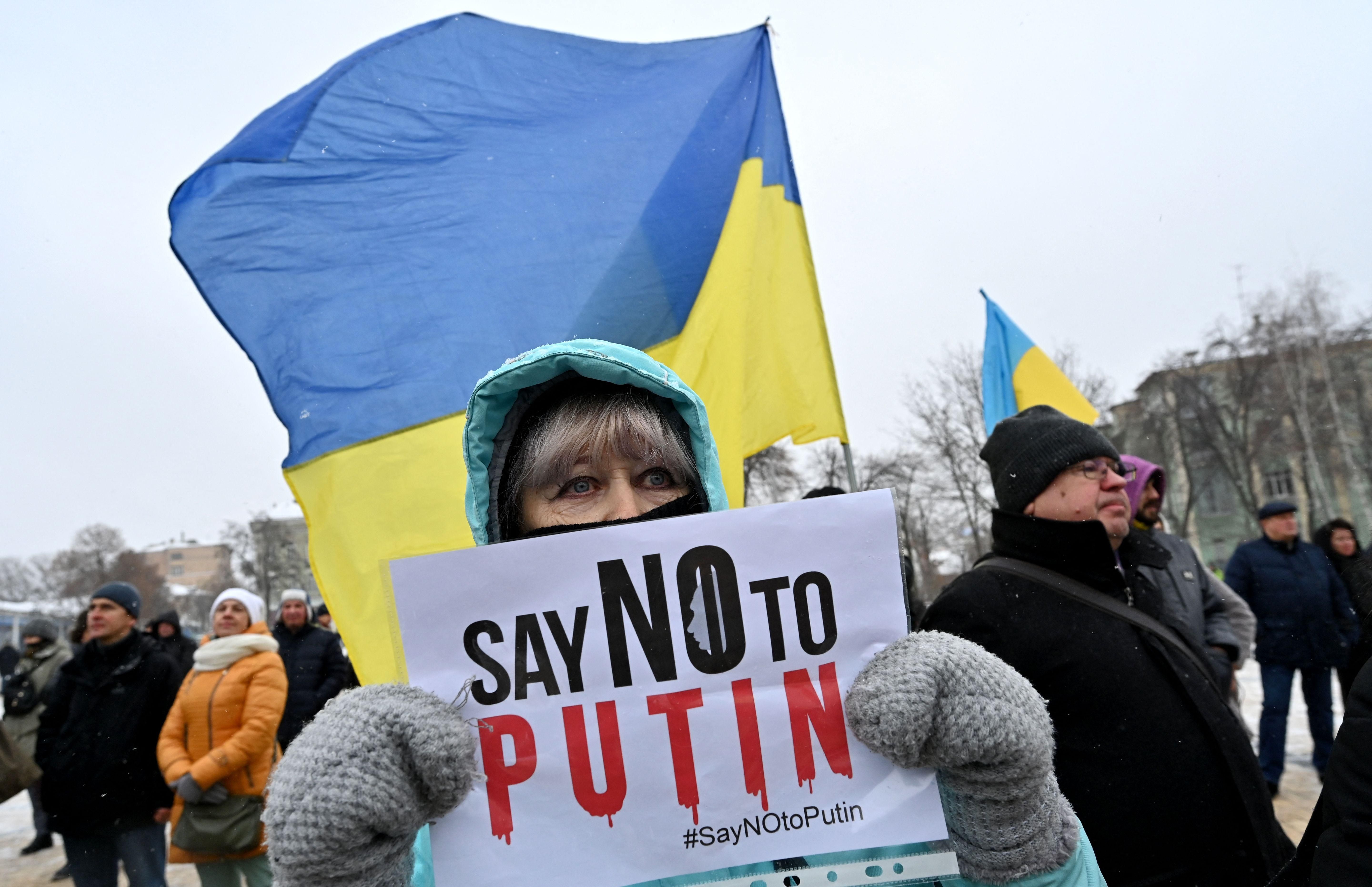 A demonstrator holds a placard during an action dubbed #SayNOtoPutin in Kyiv, Ukraine on January 9, 2022