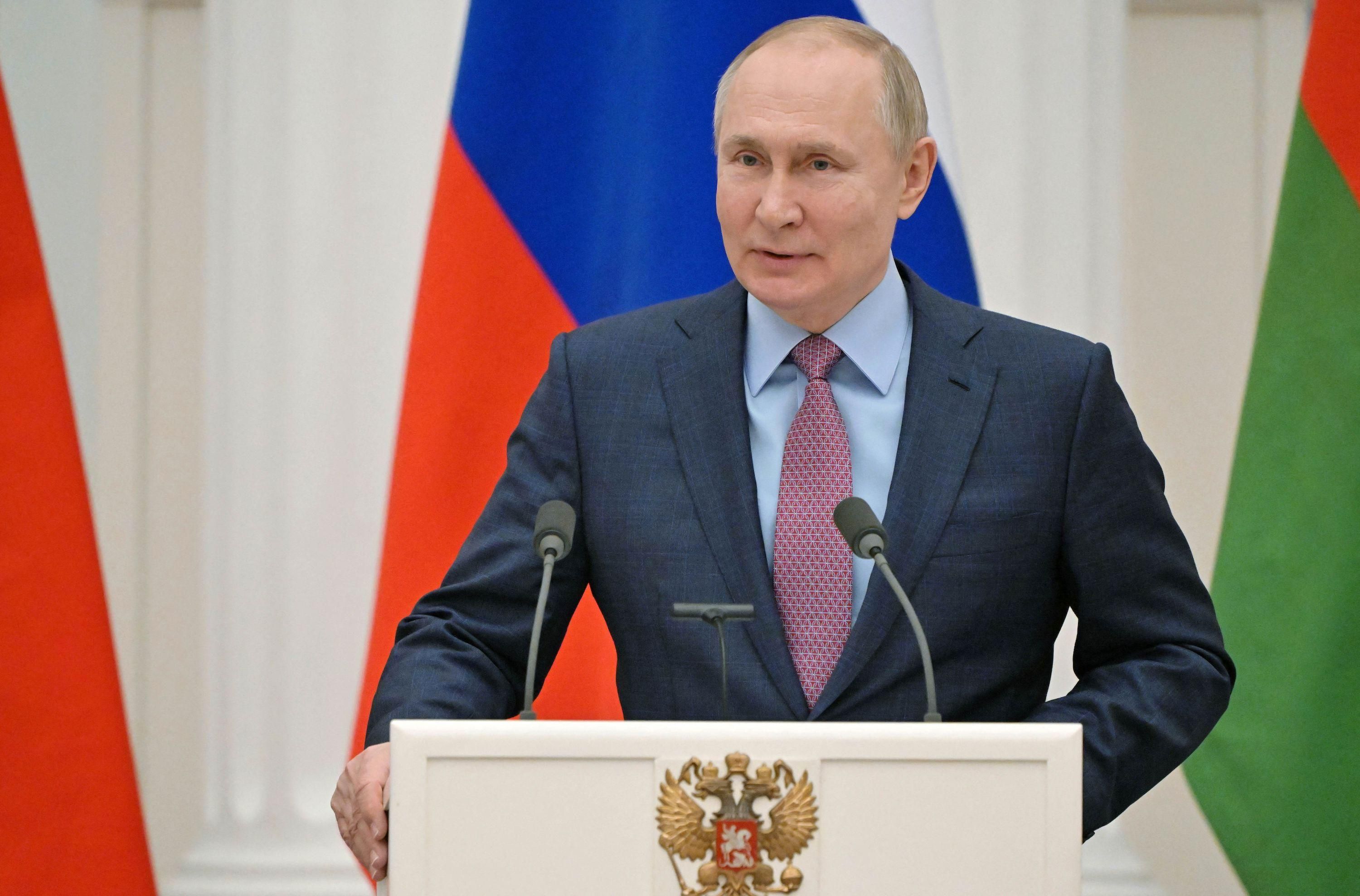 Russia's President Vladimir Putin speaks during a press conference with his Belarus counterpart, following their talks at the Kremlin in Moscow on February 18, 2022