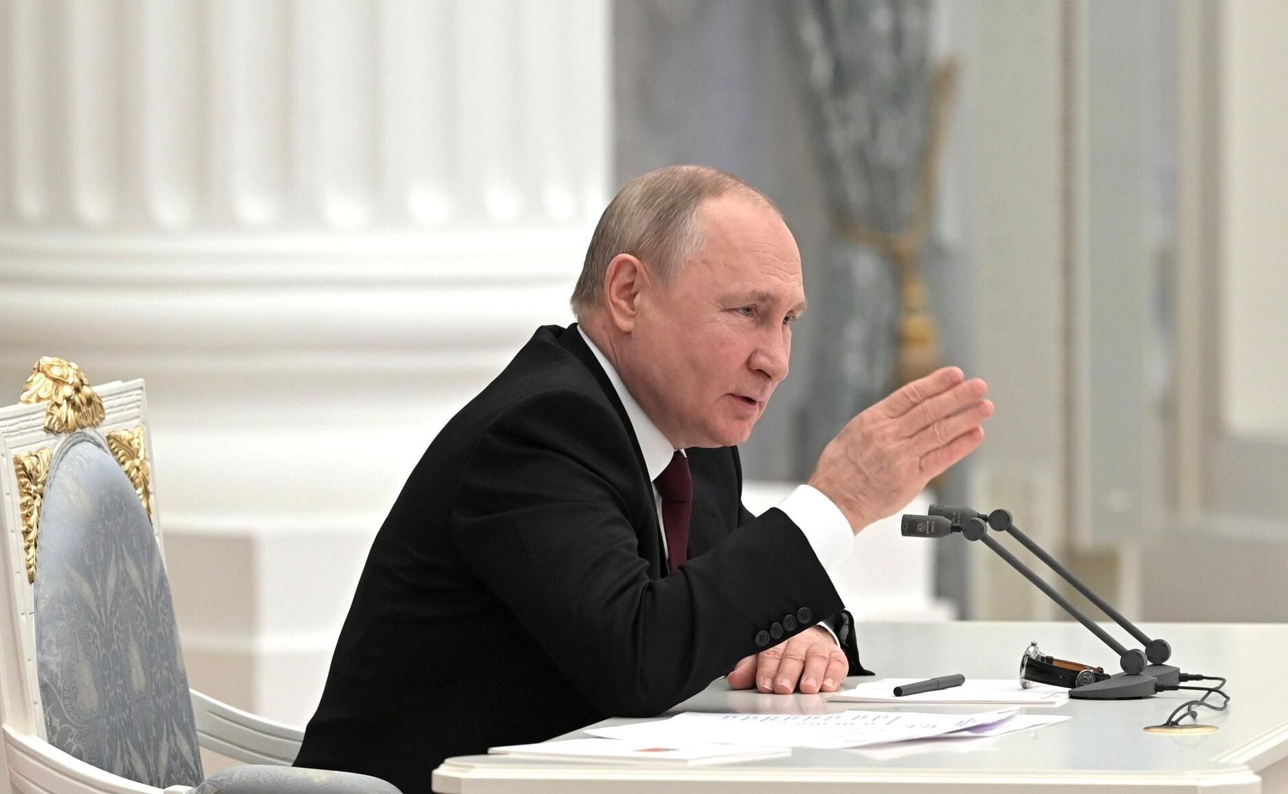 Russian President Vladimir Putin addresses the public