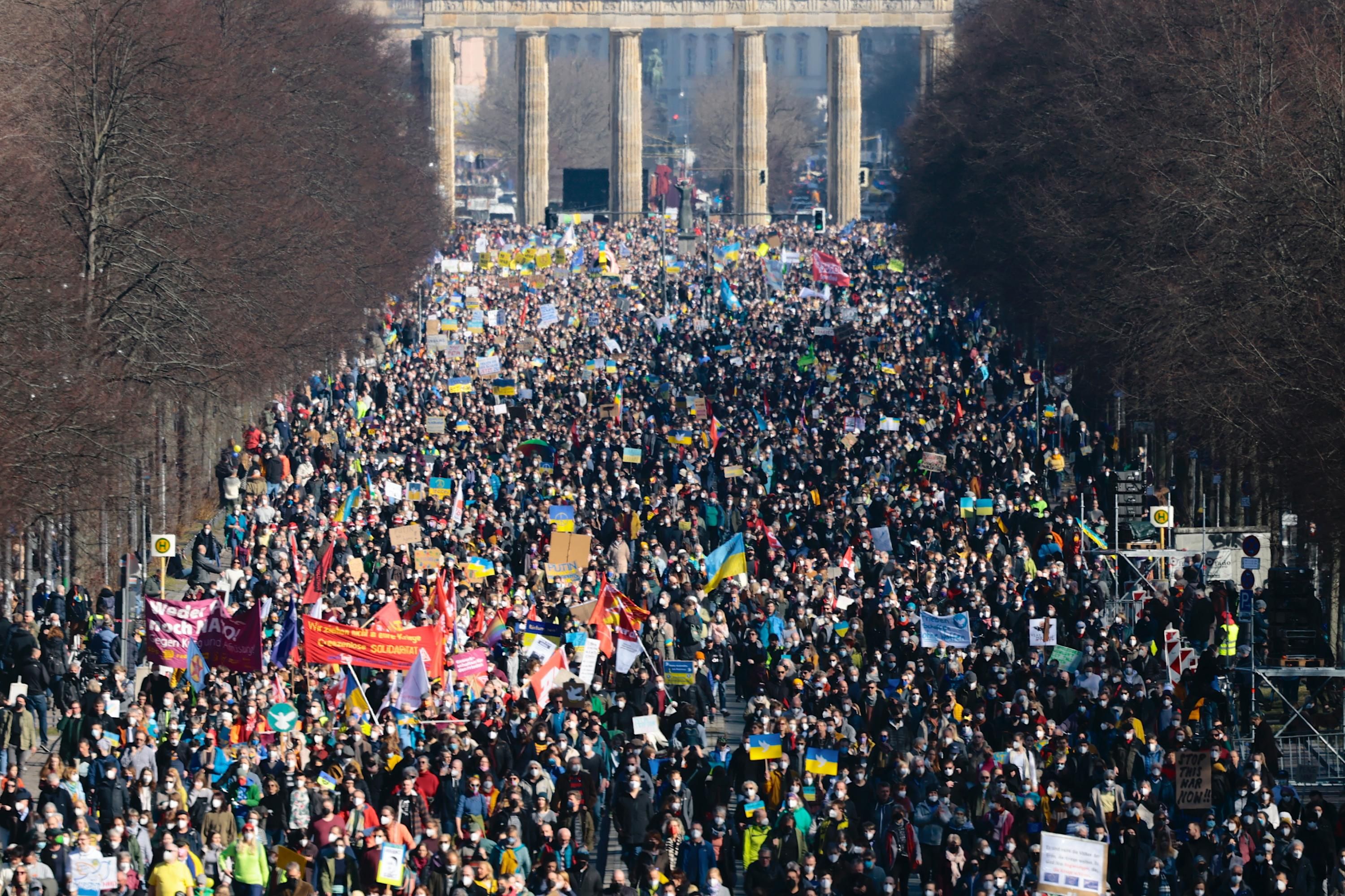 Anti-war demonstrators march in a Berlin street.