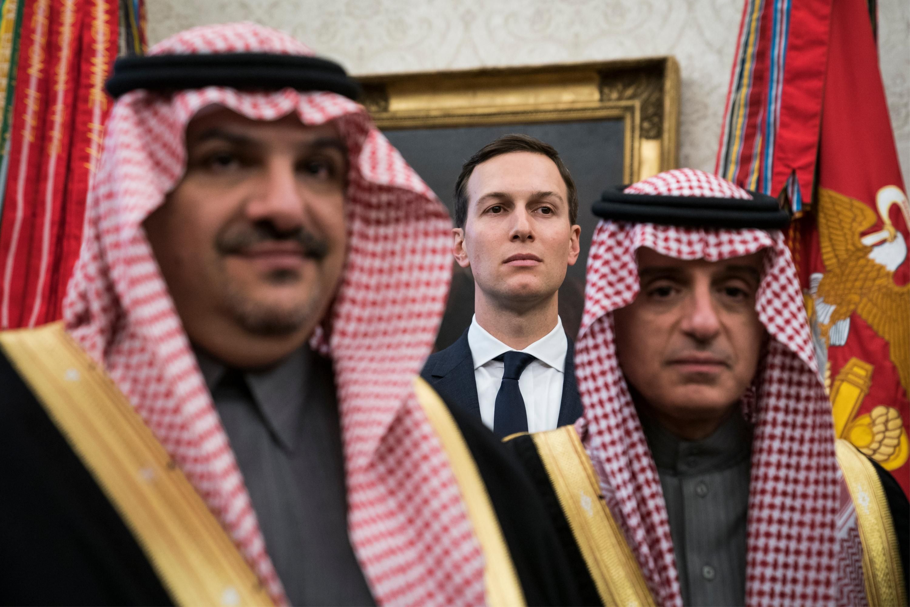 Jared Kushner stands with Saudi officials in the White House