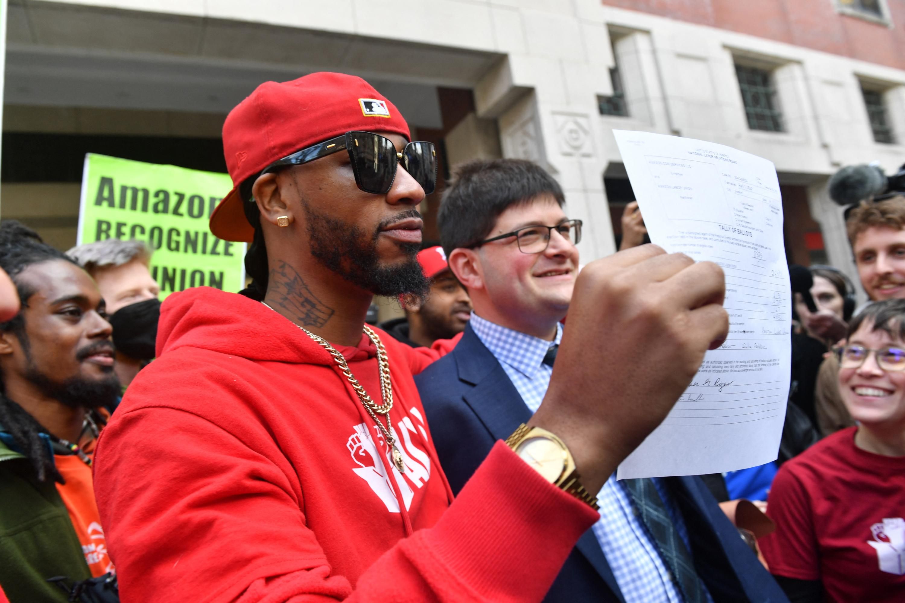 Christian Smalls celebrates with Amazon workers