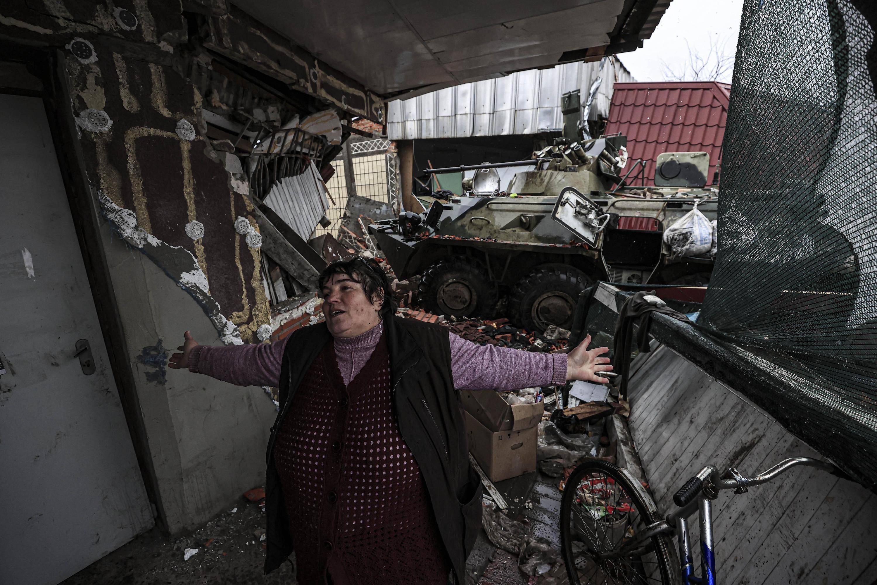 A civilian reacts after Ukrainian soldiers took back Chernihiv region from Russian forces on April 2, 2022. (Photo: Metin Aktas/Anadolu Agency via Getty Images)