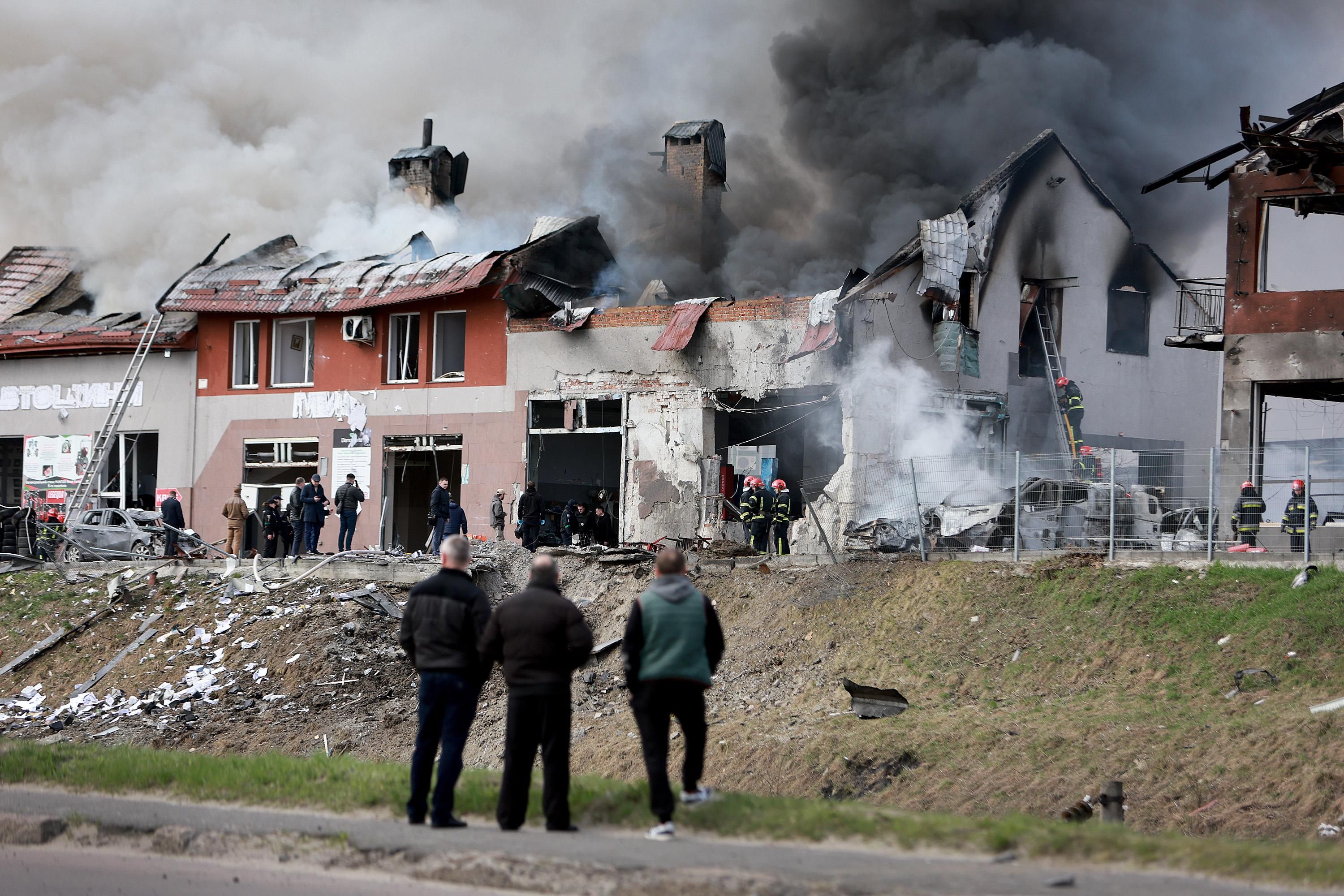 Firefighters combat a blaze in Lviv