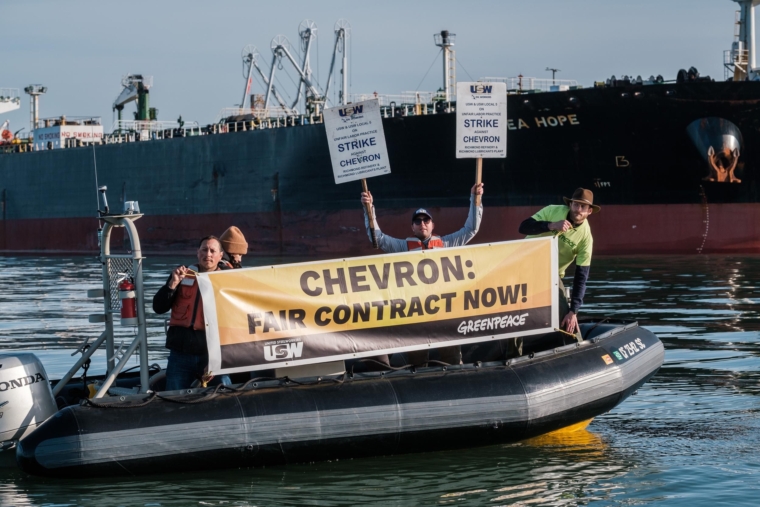 Activists with Greenpeace USA joined United Steelworkers (USW) Local 5 union members on April 29, 2022 to expand the picket line onto the waters of San Francisco Bay. Nearly 500 workers from Chevron's Richmond refinery have been on strike for weeks as they fight for a new labor contract.