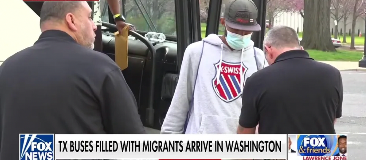 The first bus of migrants that Republican Texas Gov. Greg Abbott sent from the U.S.-Mexico border to Washington, D.C. arrived outside an office building that houses Fox News on April 13, 2022.