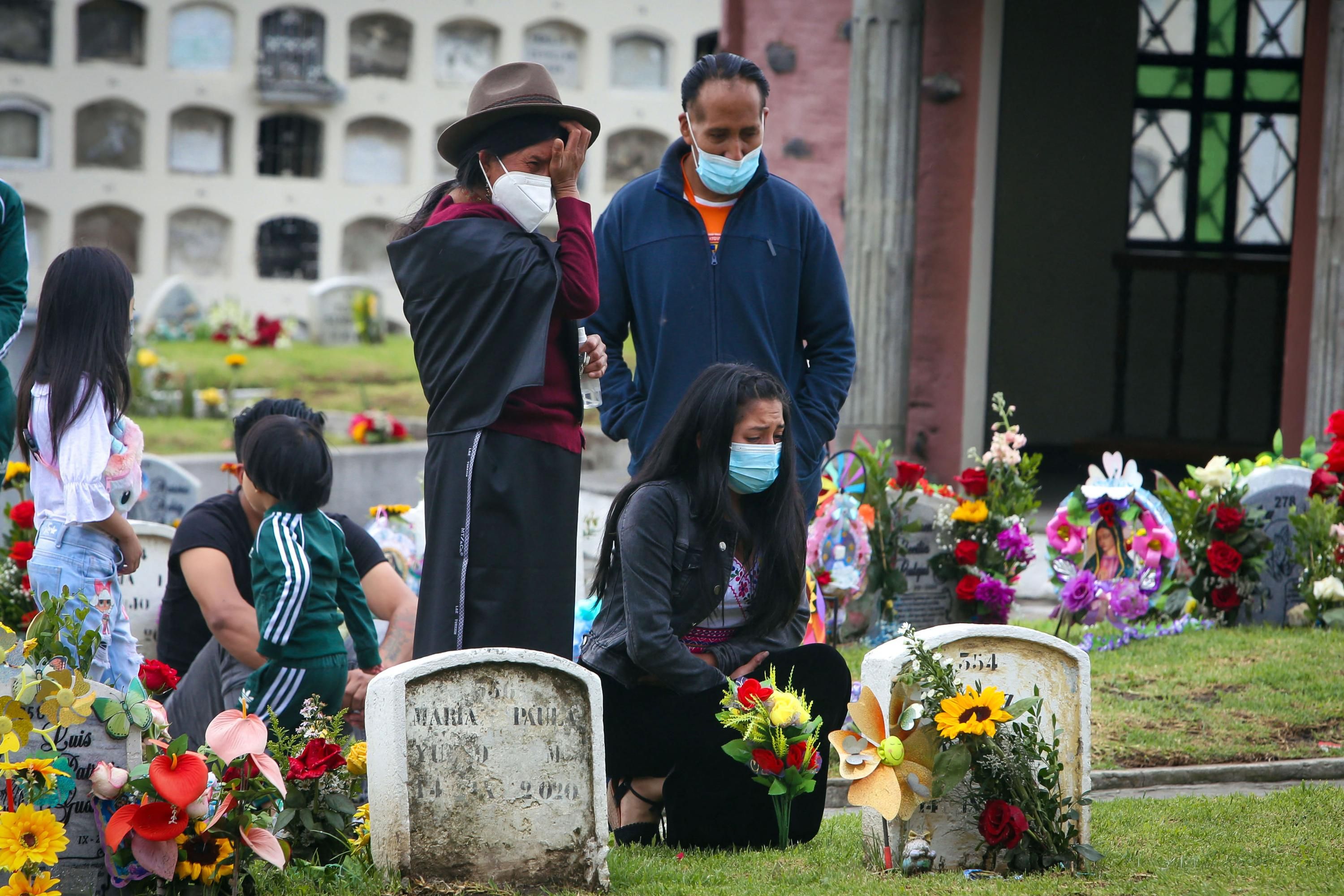 A family mourns a loved on in Ecuador