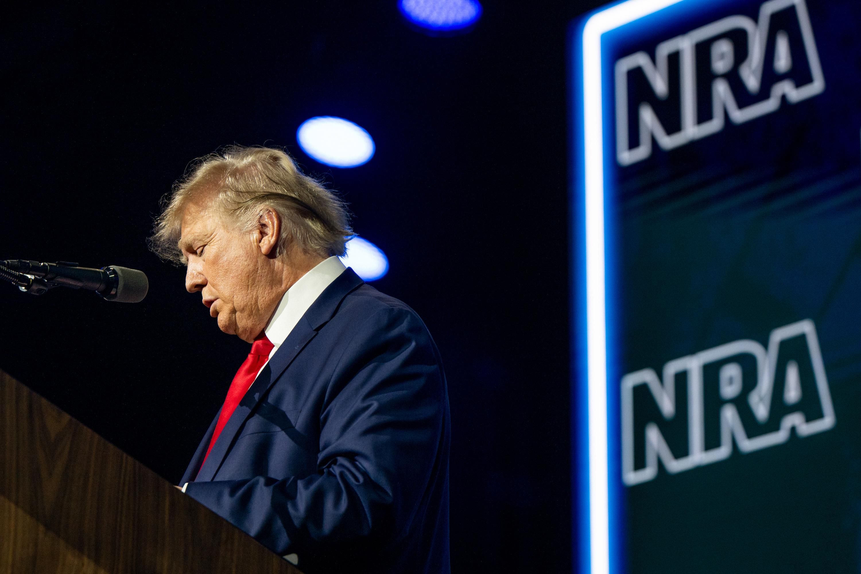 Former U.S. President Donald Trump reads the names of the victims of the Uvalde, Texas mass shooting during the National Rifle Association (NRA) annual convention on May 27, 2022 in Houston. (Photo: Brandon Bell/Getty Images)