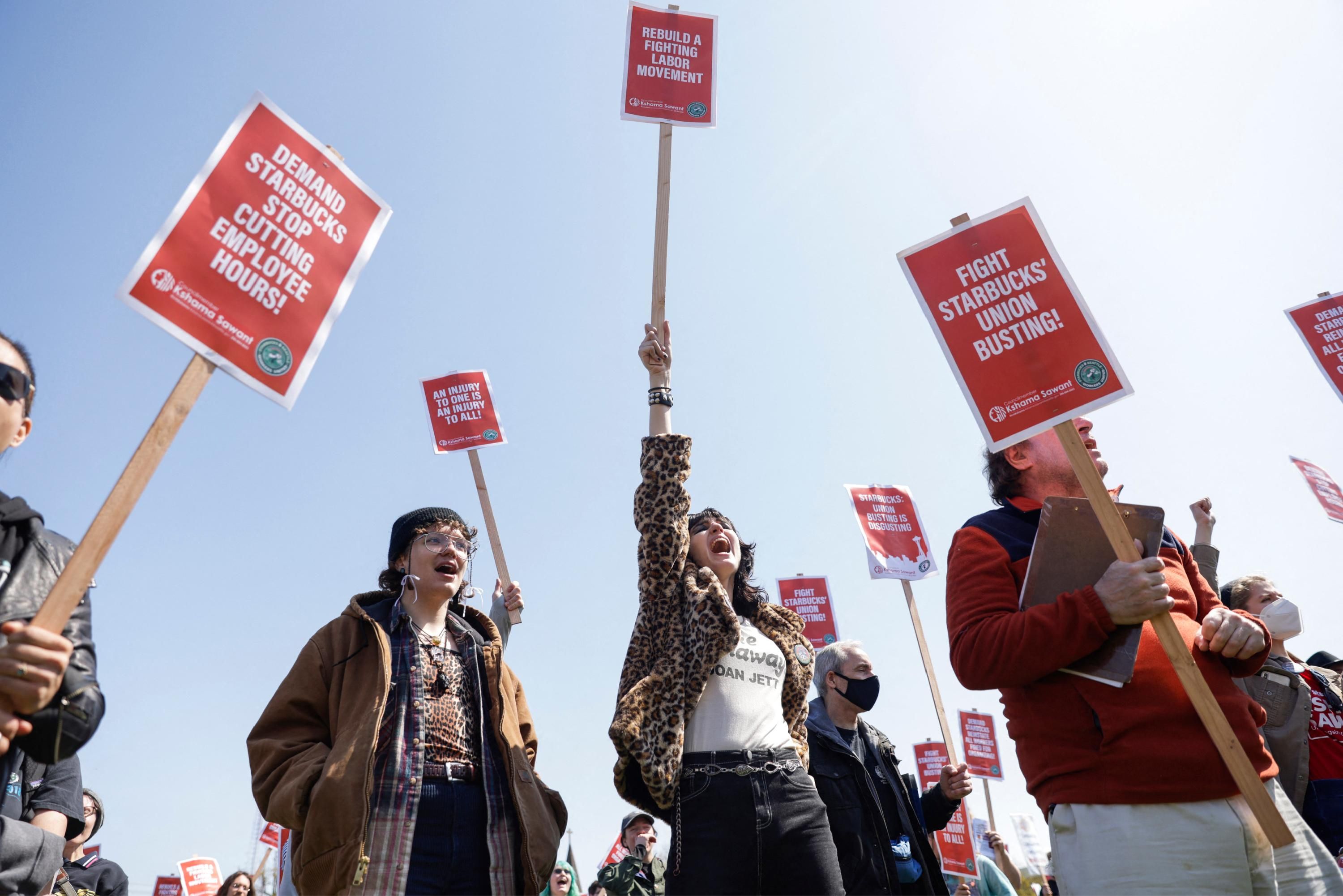 Demonstrators attend a rally against Starbucks union-busting