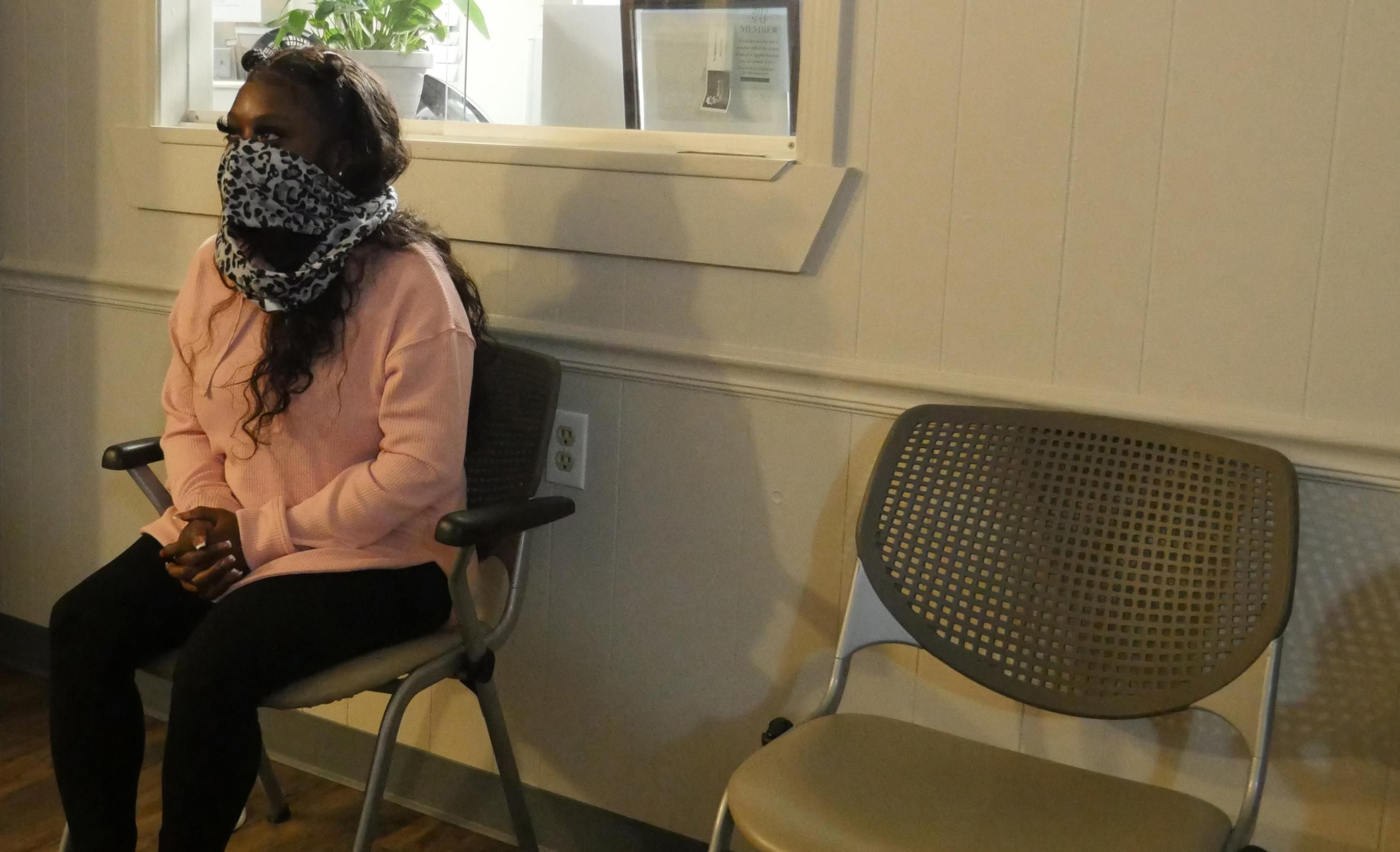 Shayla, who has made the five-hour drive from Texas to Louisiana twice, sits in the waiting room of the Hope Medical Group for Women in Shreveport, Louisiana
on April 19, 2022. 