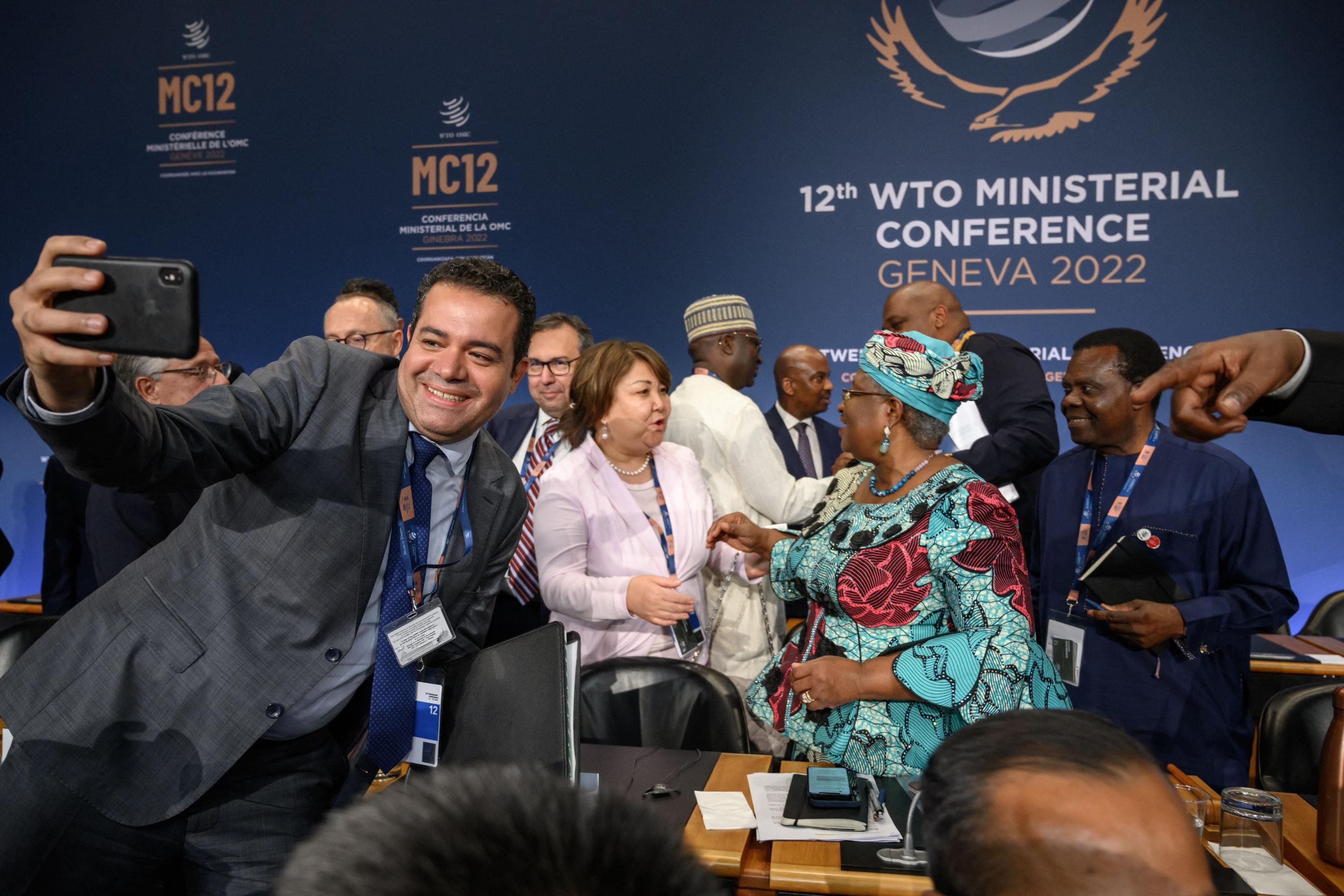 WTO delegates seen during the final day of the ministerial conference