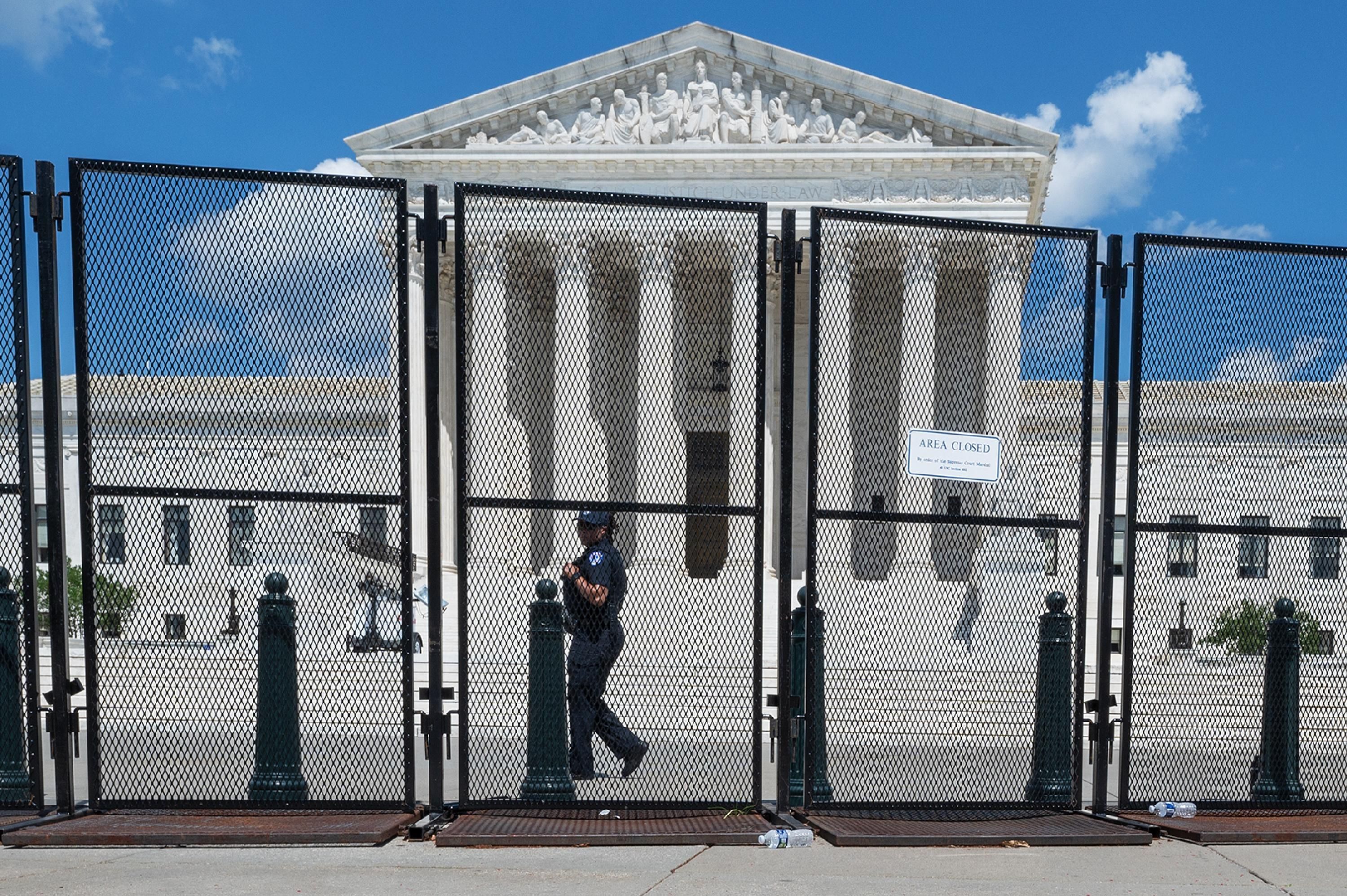 A fence blocks the entrance to the U.S. Supreme Court