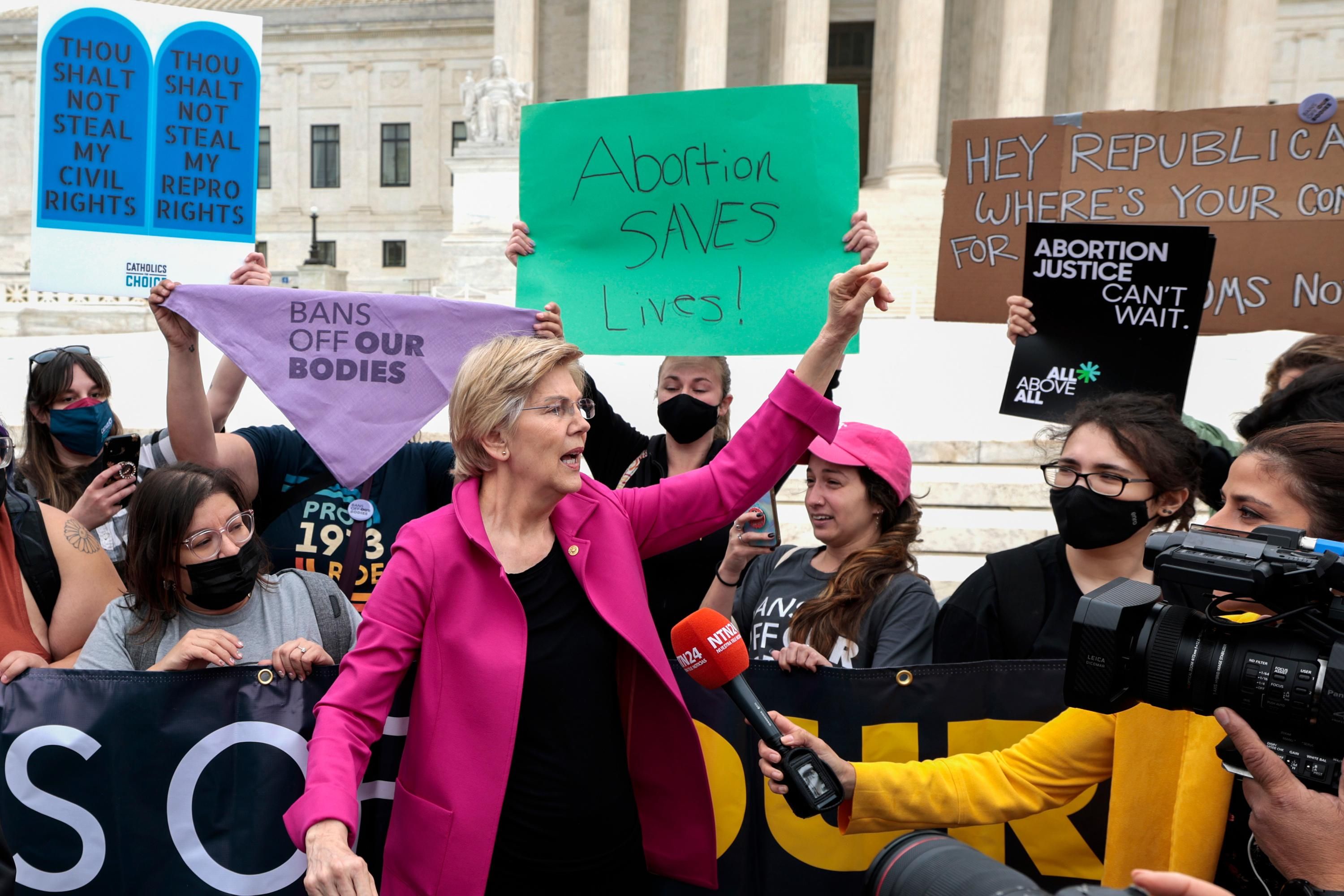 Sen. Elizabeth Warren speaks outside the U.S. Supreme Court building