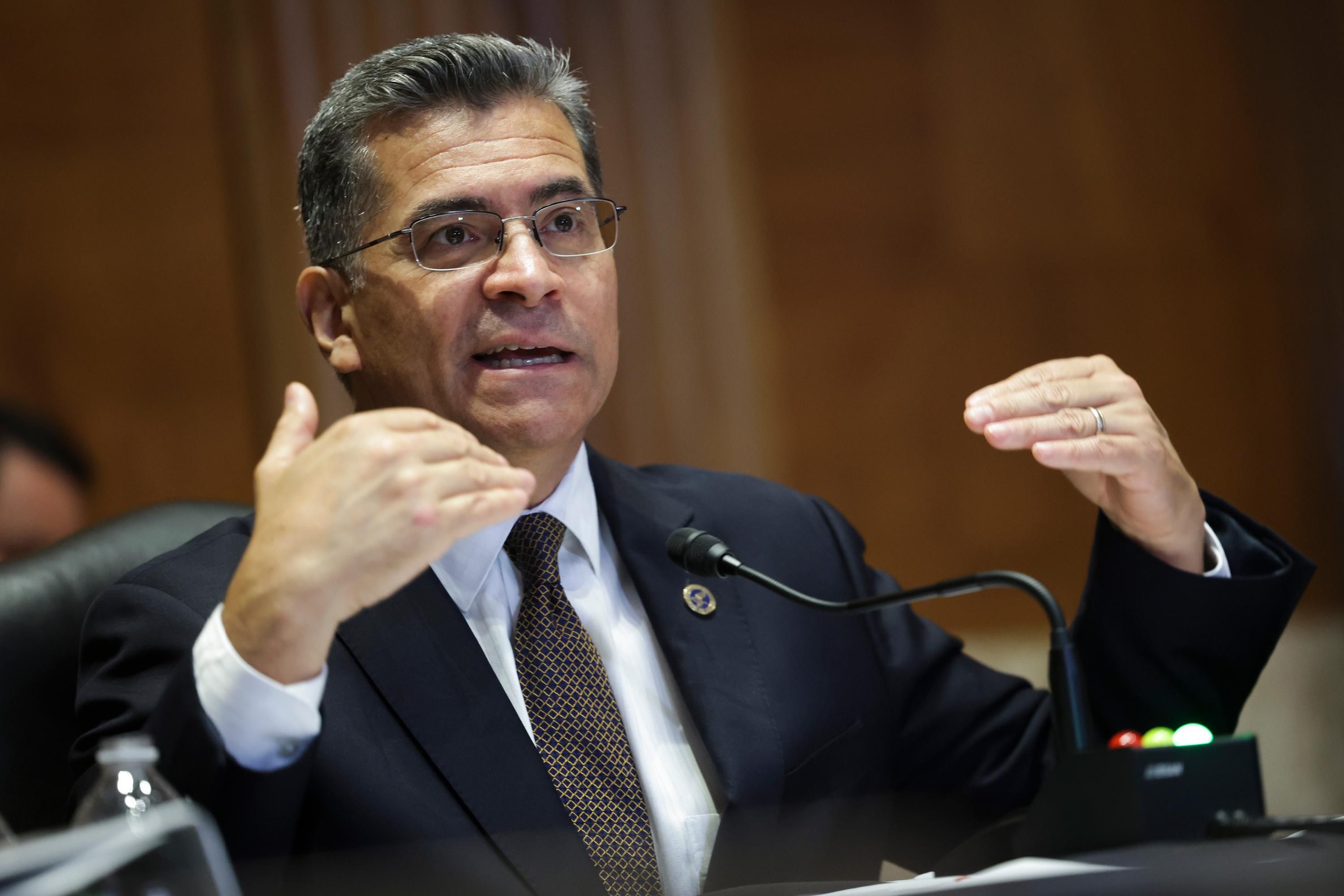 HHS Secretary Xavier Becerra speaks at a hearing