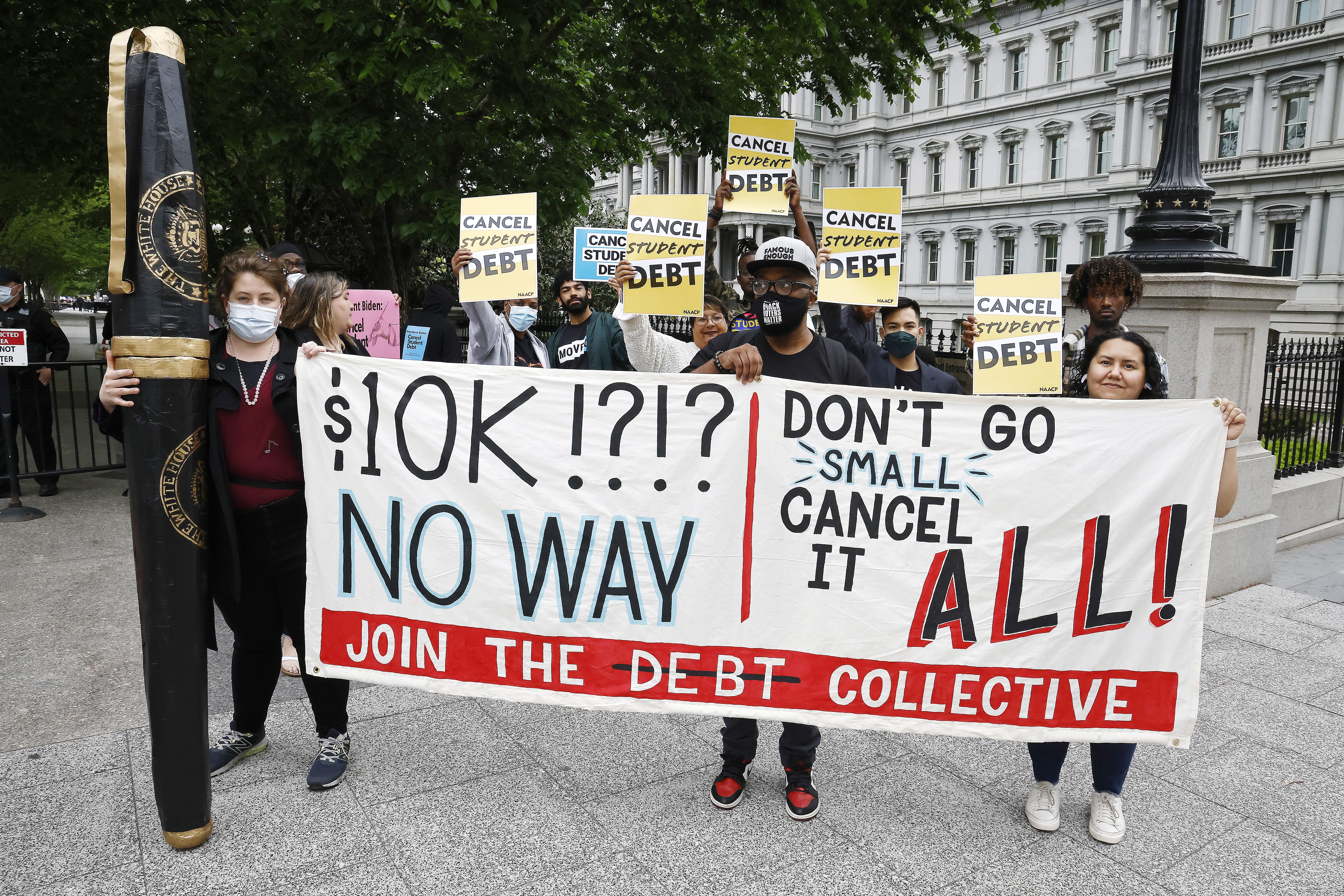 People gather near the White House to tell President Joe Biden to cancel student loan debt on May 12, 2020 in Washington, D.C.