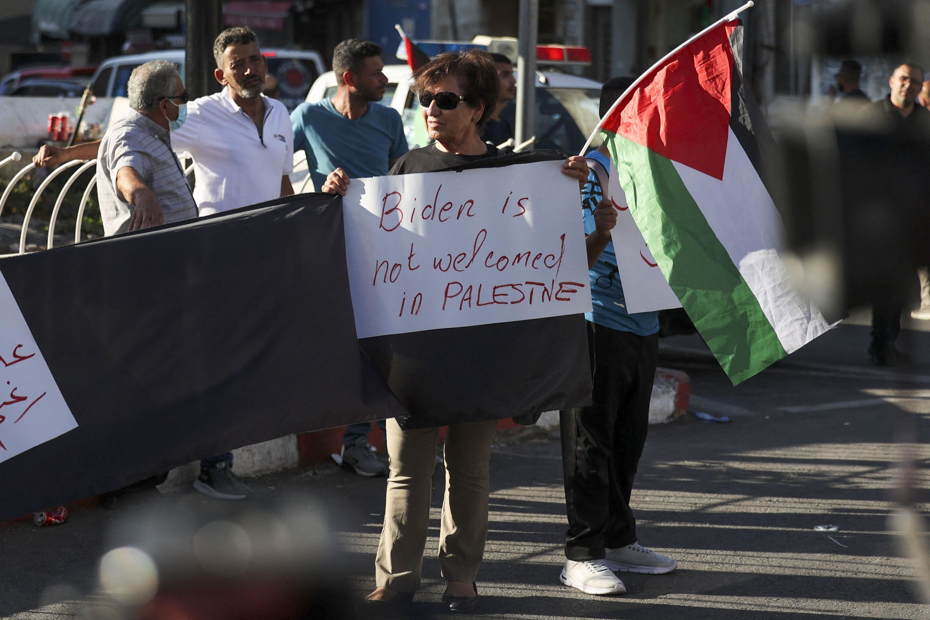 A Palestinian protests U.S. President Joe Biden's visit