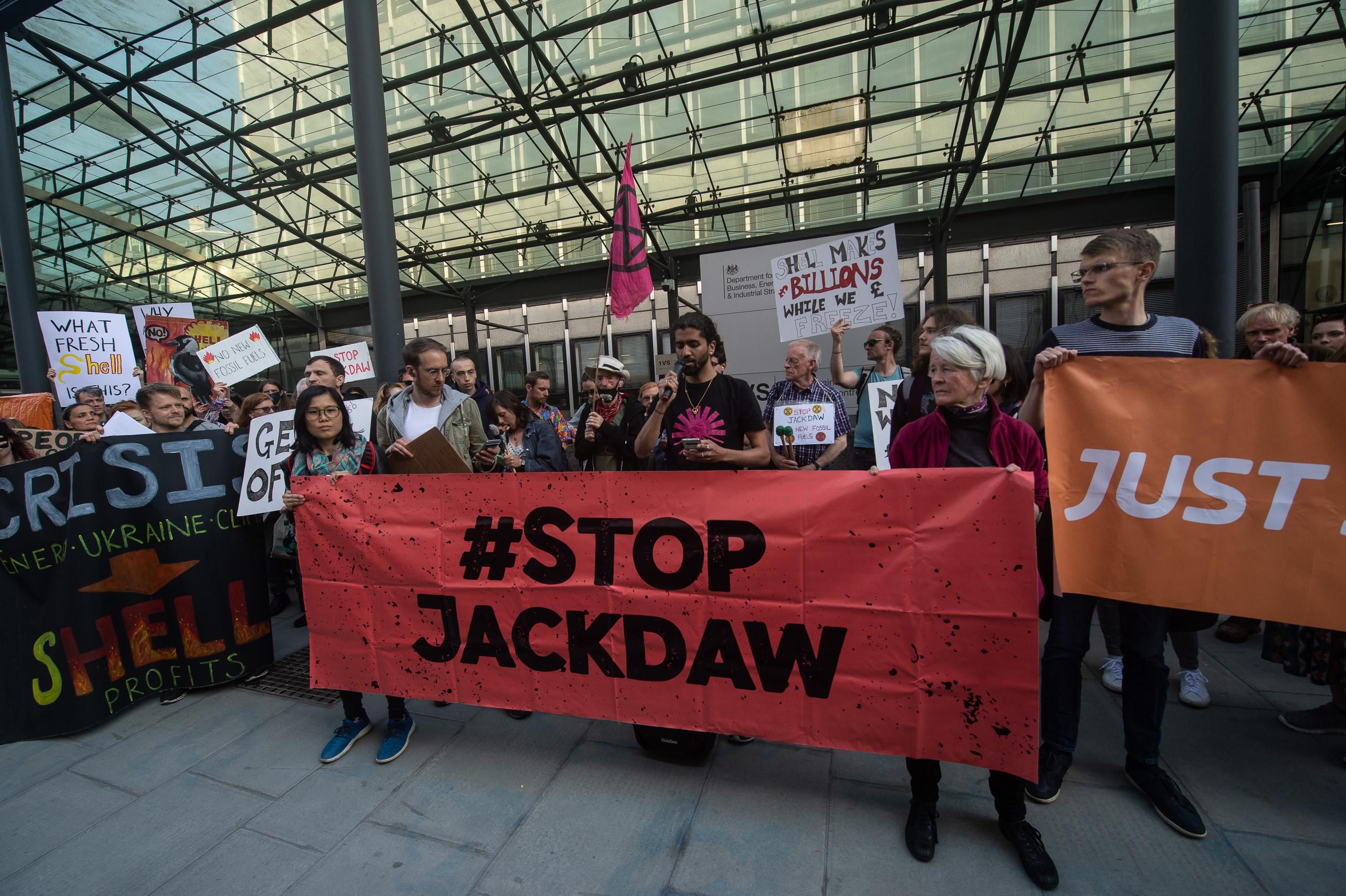 Environmental activists demonstrate against the proposed Jackdaw gas field on June 2, 2022 in London.