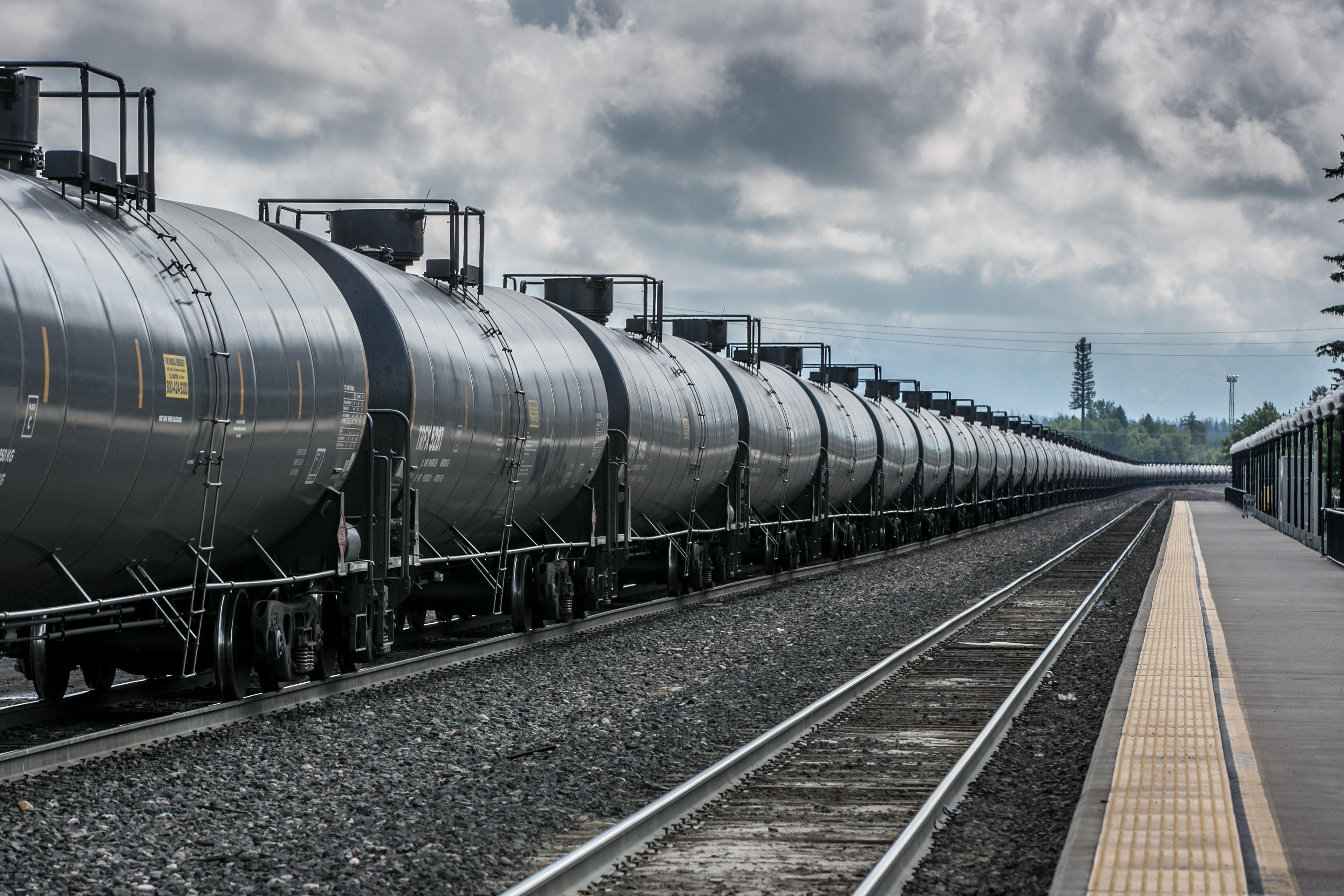 A BNSF freight train hauling tankers loaded with crude oil heads west through a transcontinental railroad hub on June 22, 2018 in Whitefish, Montana, home to Glacier National Park.