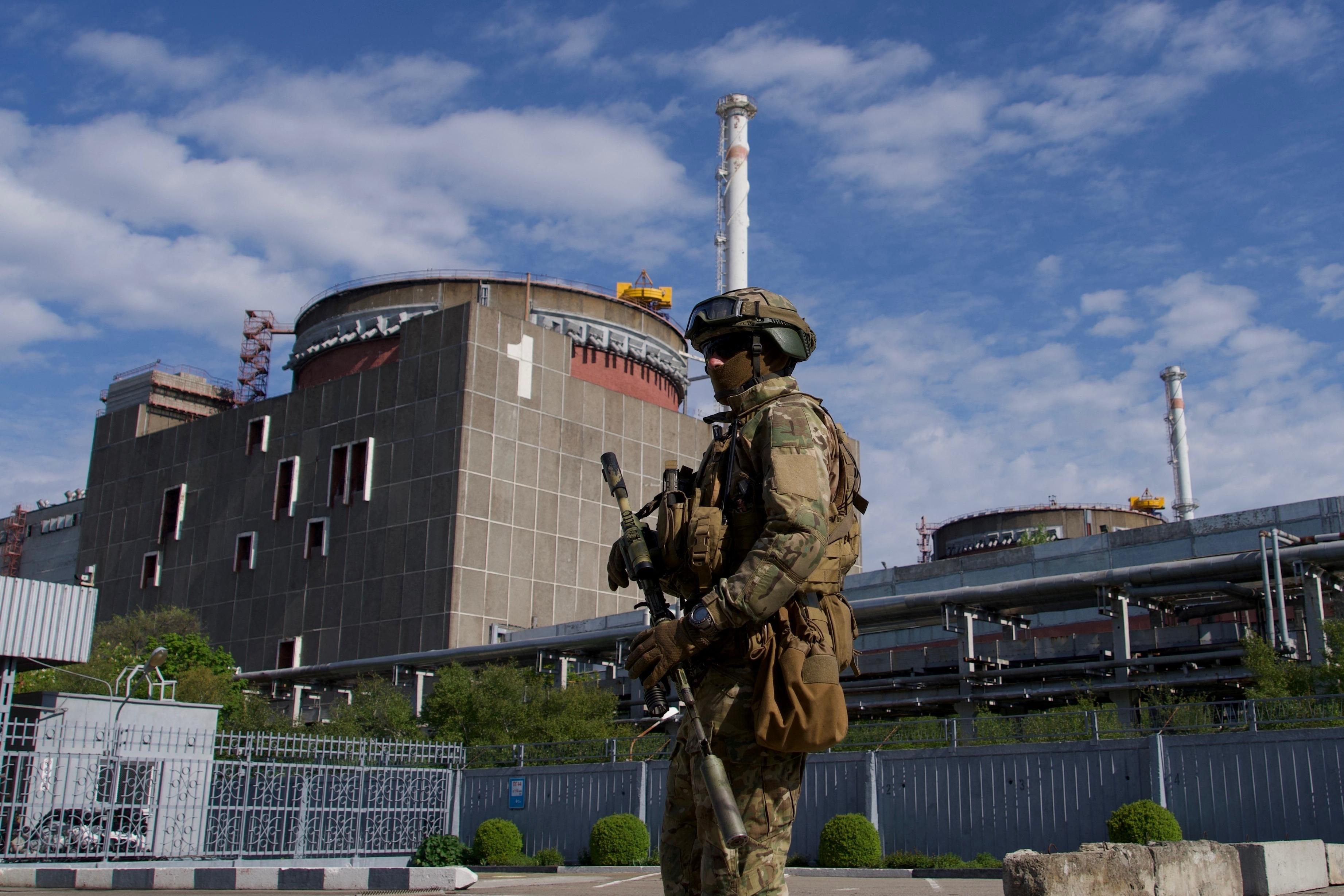 A Russian soldier patrols the territory of the Zaporizhzhia Nuclear Power Station in Energodar, Ukraine on May 1, 2022.