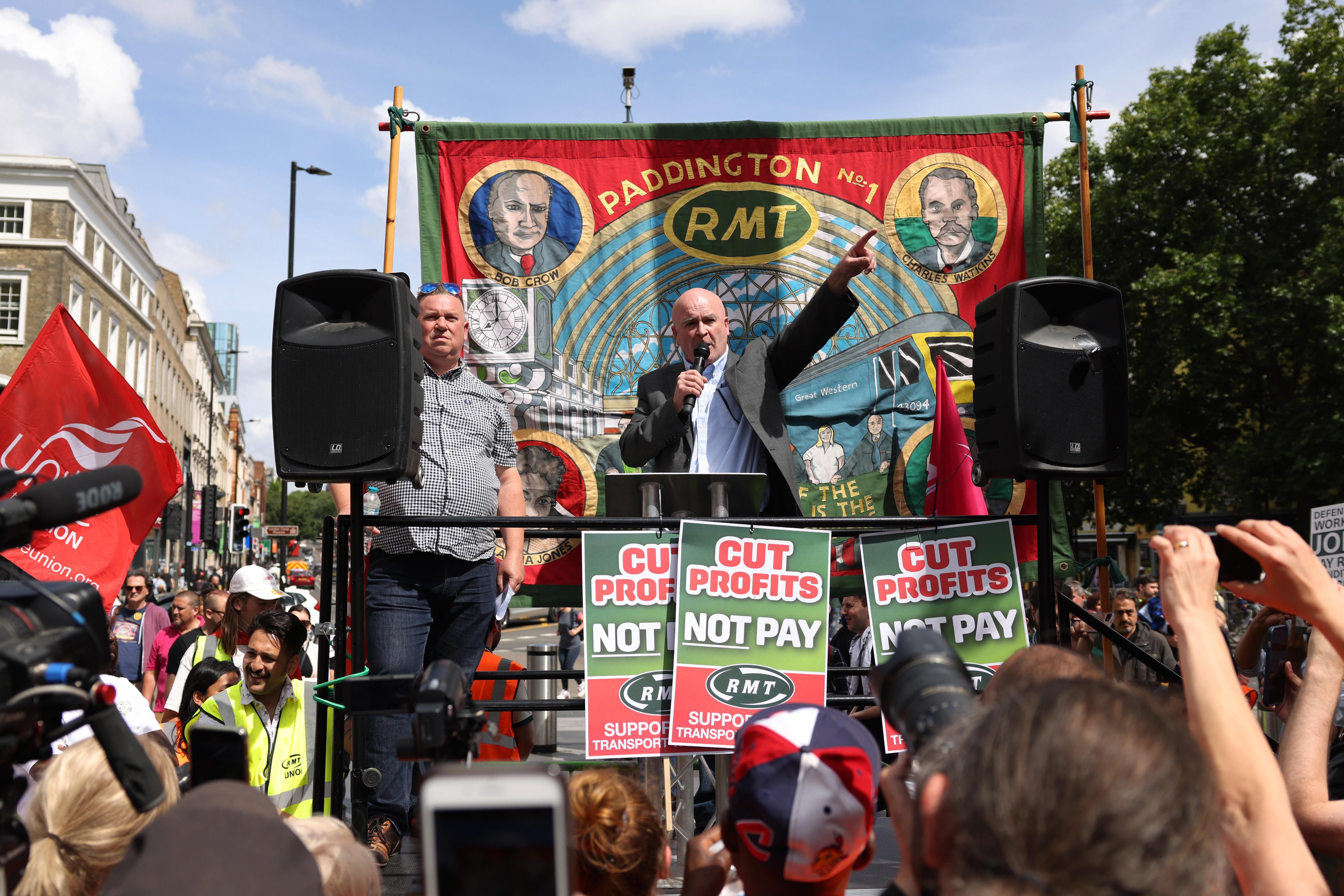Mick Lynch, general secretary of the National Union of Rail, Maritime, and Transport Workers, speaks during a rail strike rally outside Kings Cross station on June 25, 2022 in London.