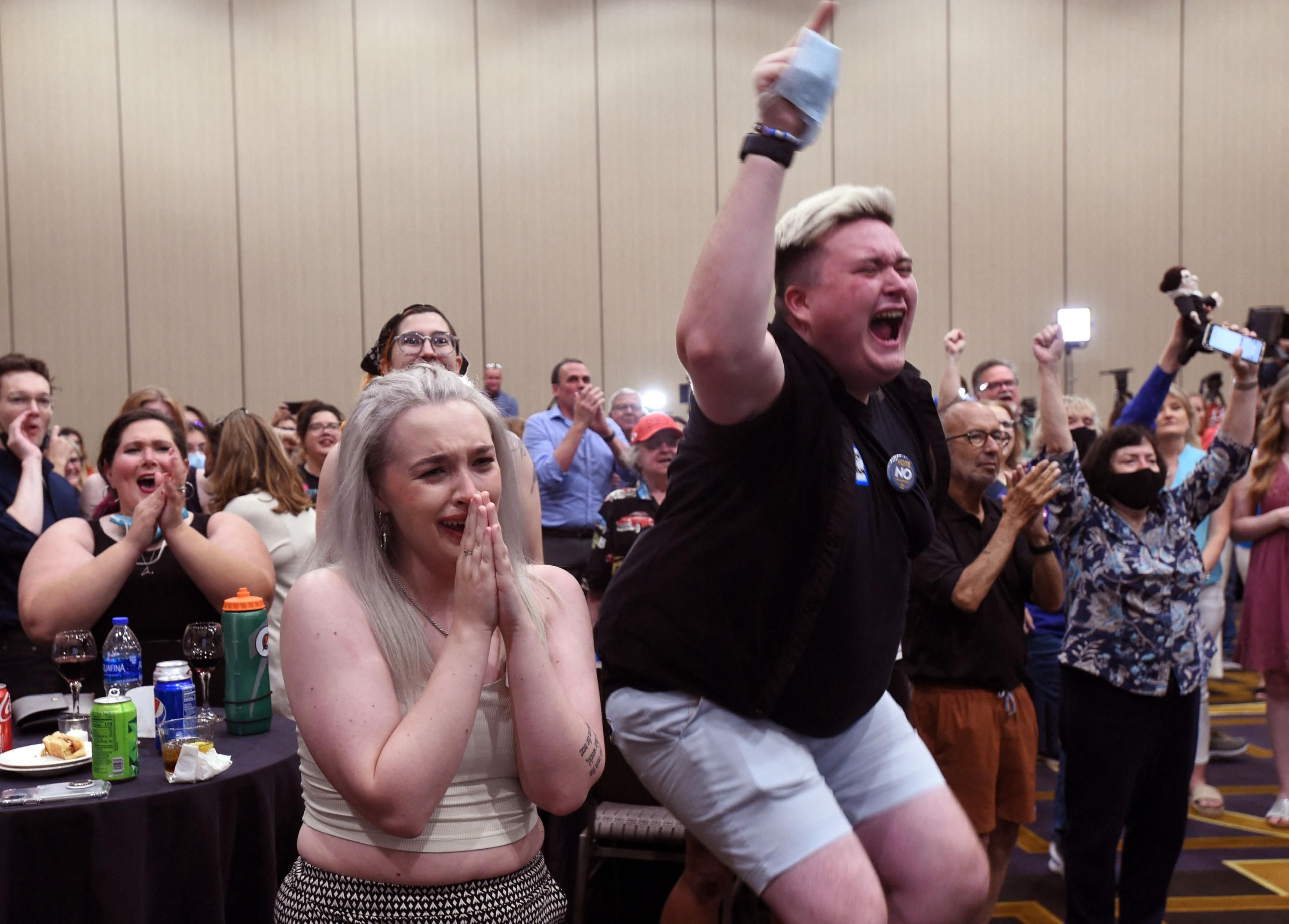 Abortion rights advocates celebrate a victory in Kansas