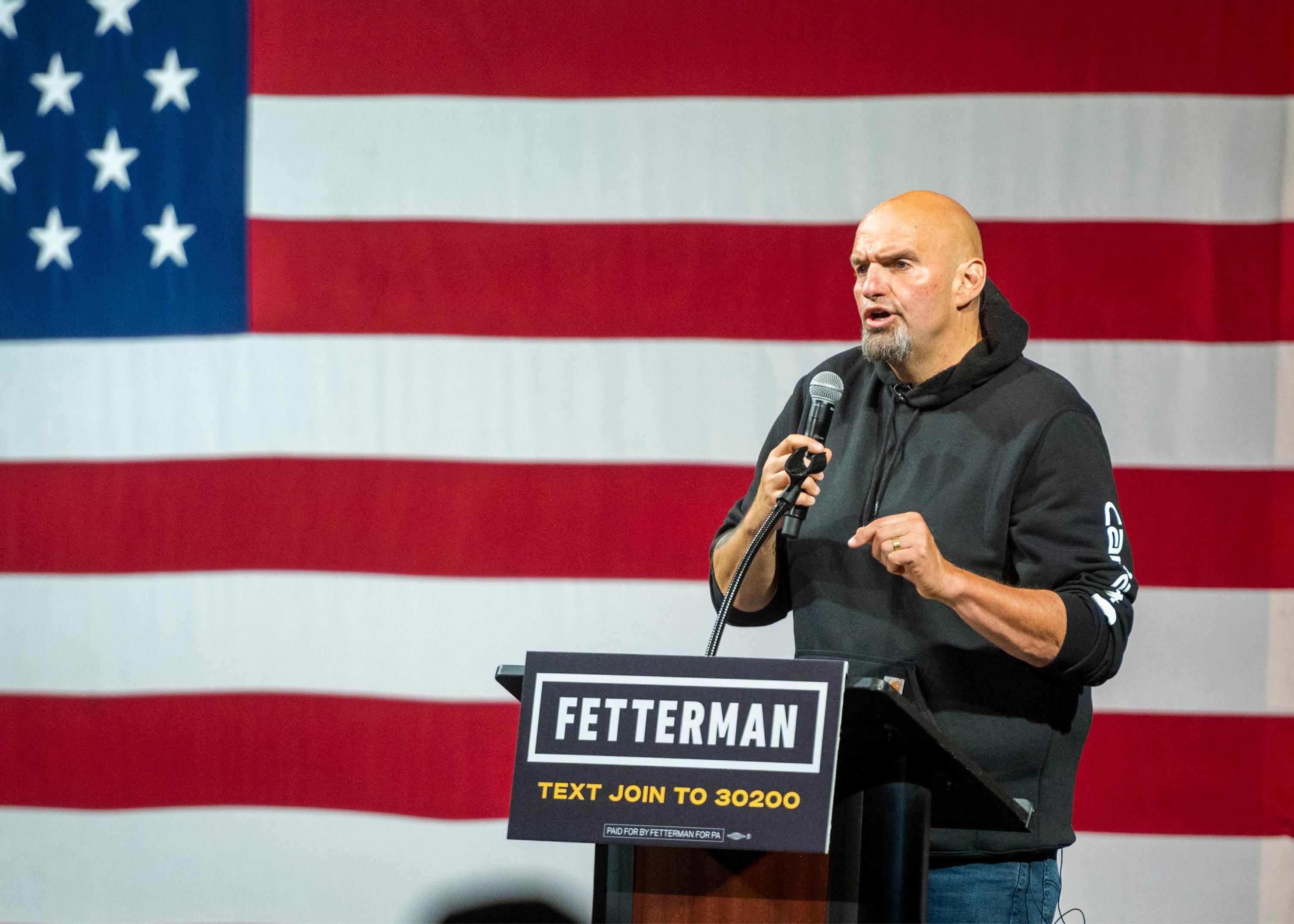 John Fetterman speaks at a rally