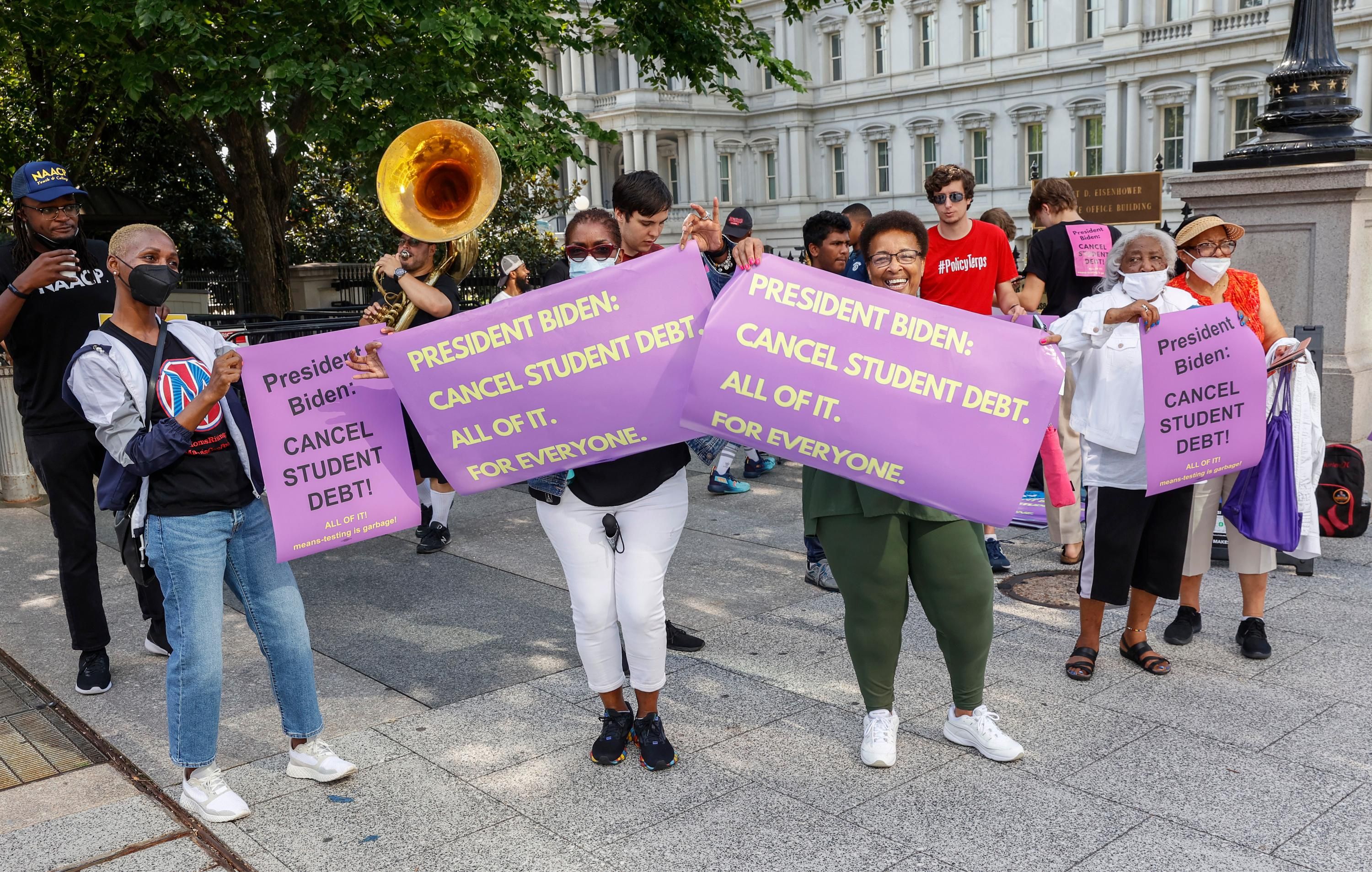 Demonstrators push President Joe Biden to cancel all outstanding student debt