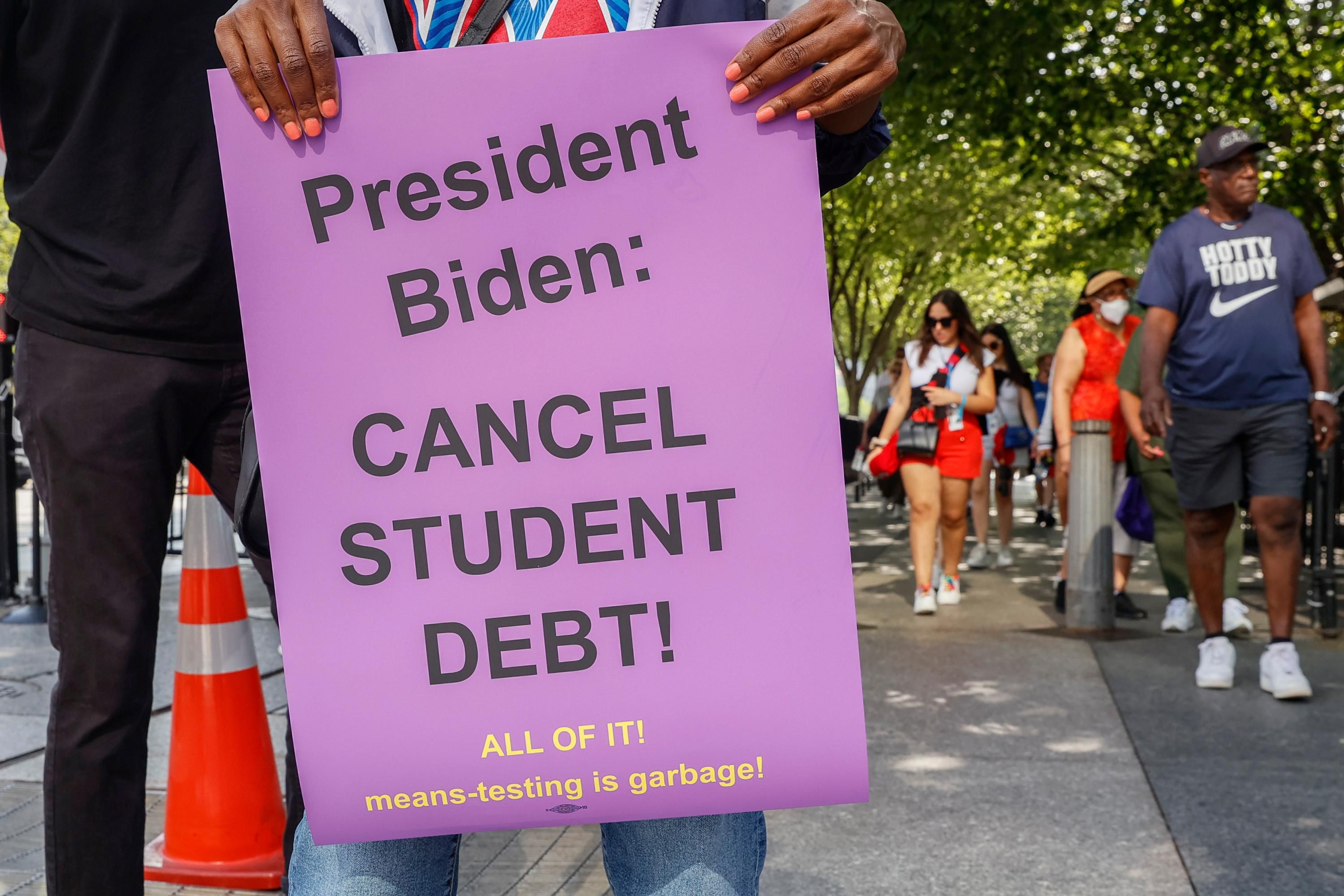 Demonstrators urge President Joe Biden to cancel student loan debt