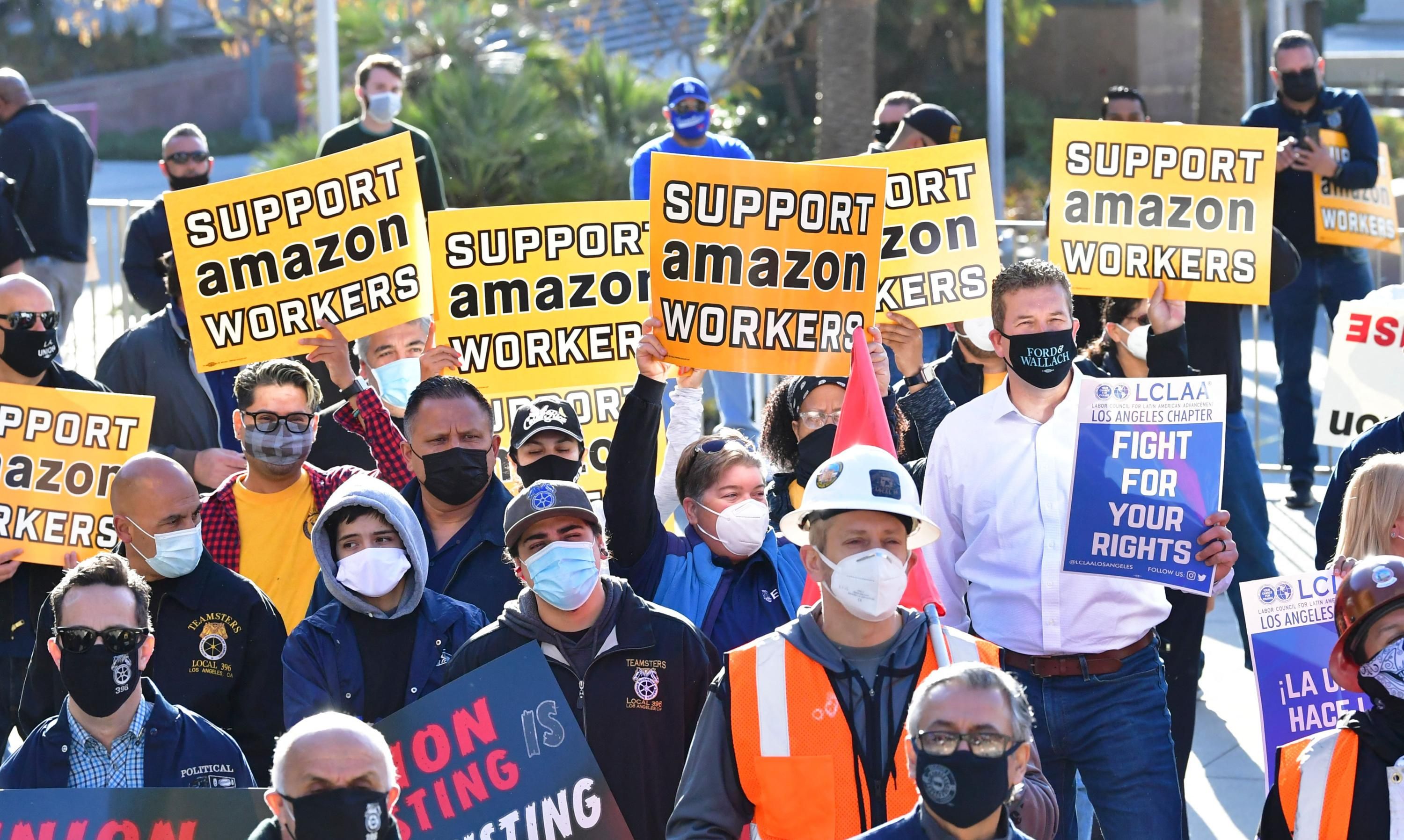 Support Amazon Workers signs at rally