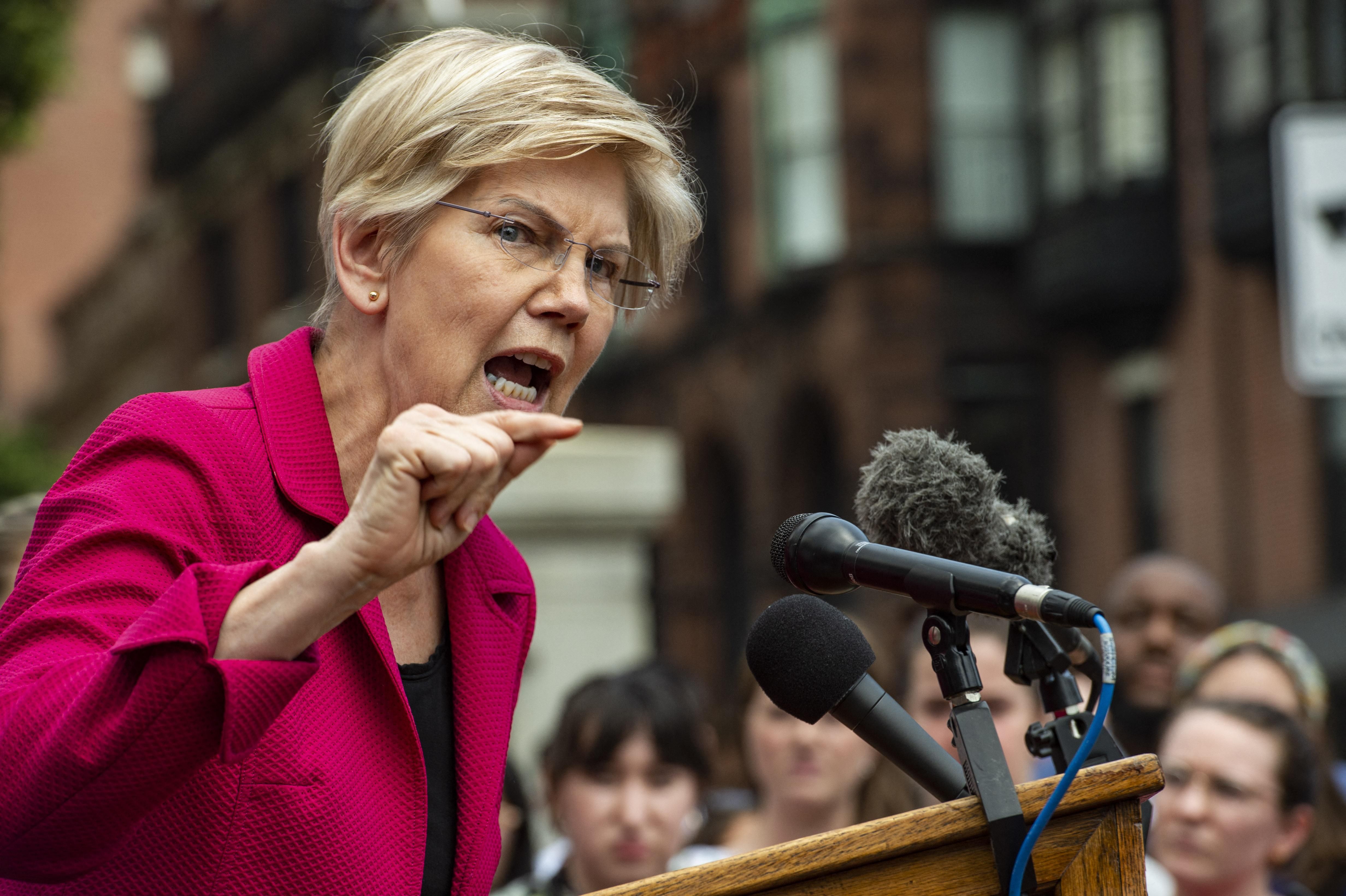 Sen. Elizabeth Warren (D-Mass.) addresses the public during a rally to protest the U.S. Supreme Court's overturning of Roe v. Wade at the Massachusetts State House in Boston on June 24, 2022. 