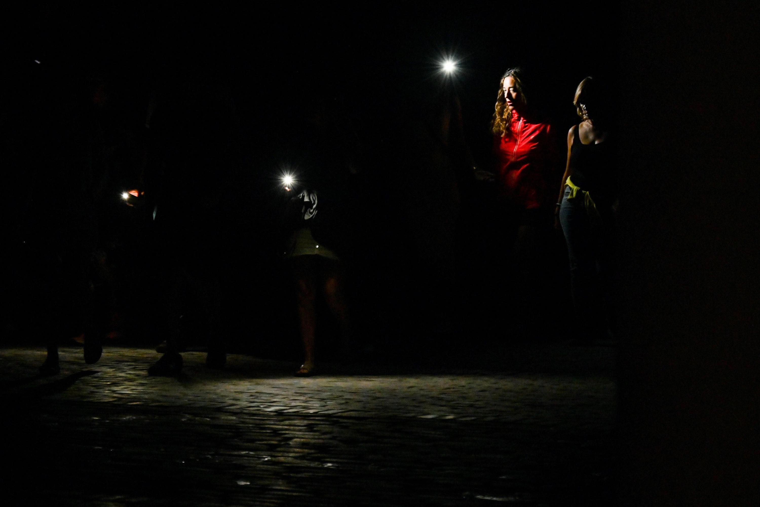 People meet in a Havana park during a blackout in Cuba