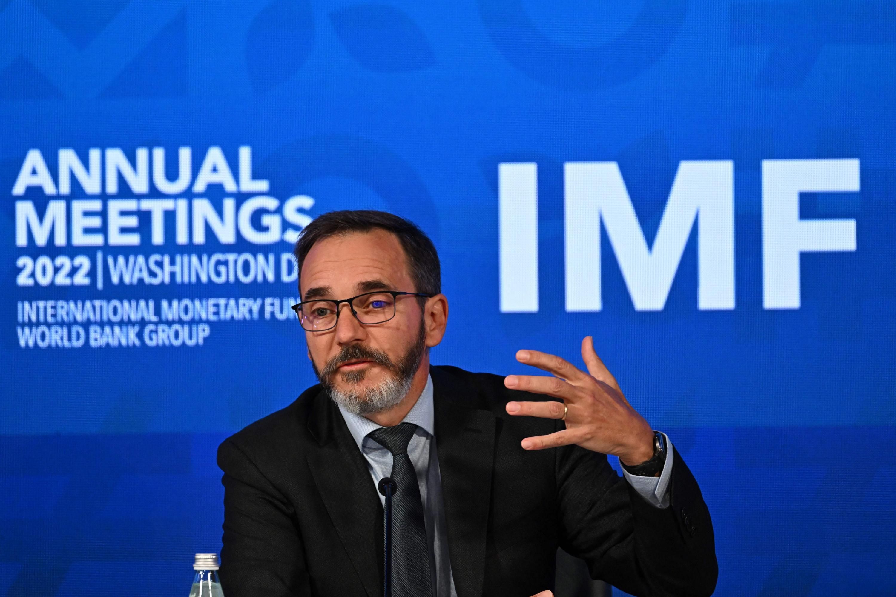 The chief economist of the IMF speaks during a press conference