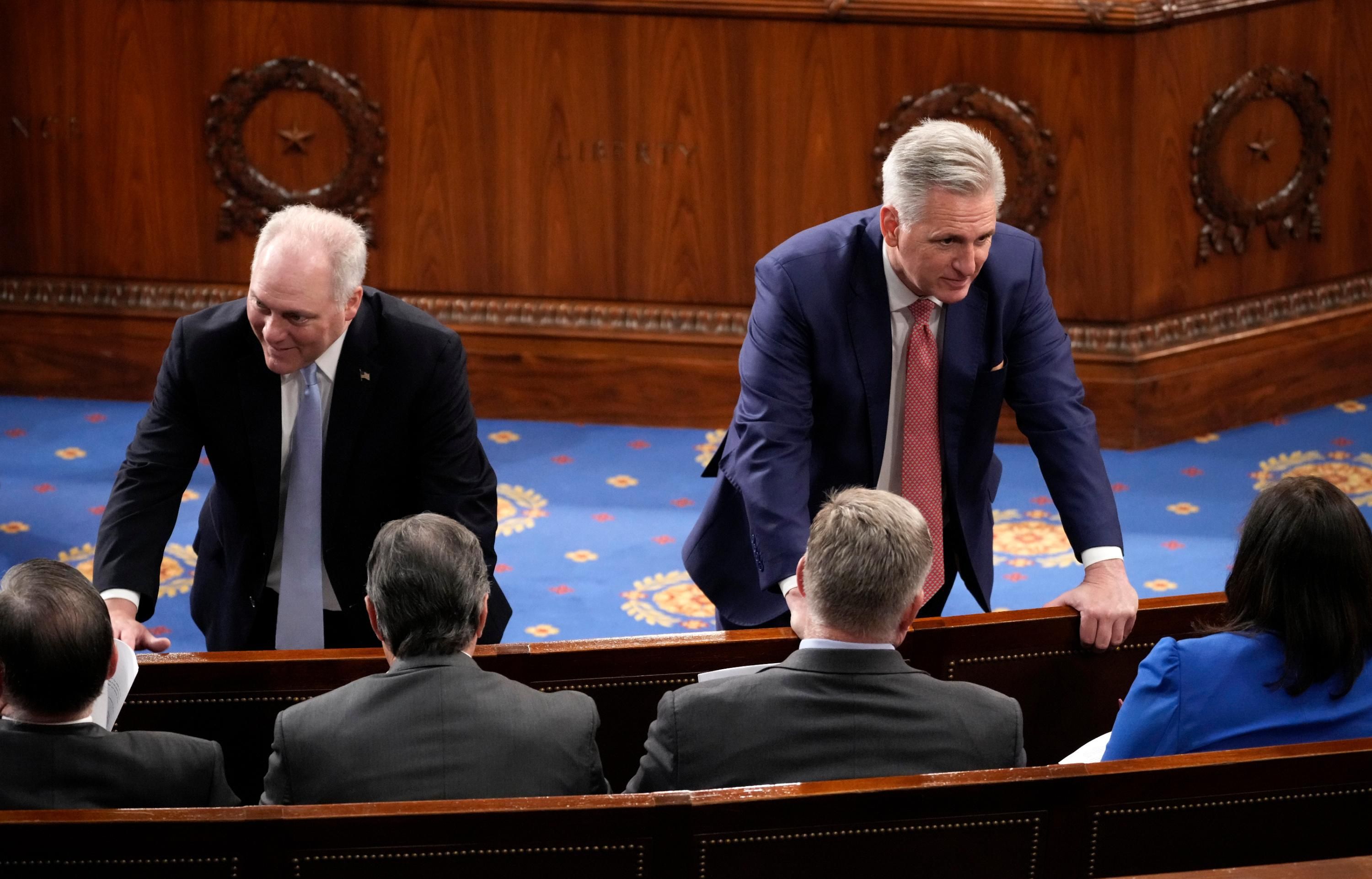 Rep. Steve Scalise and House Minority Leader Kevin McCarthy talk to colleagues