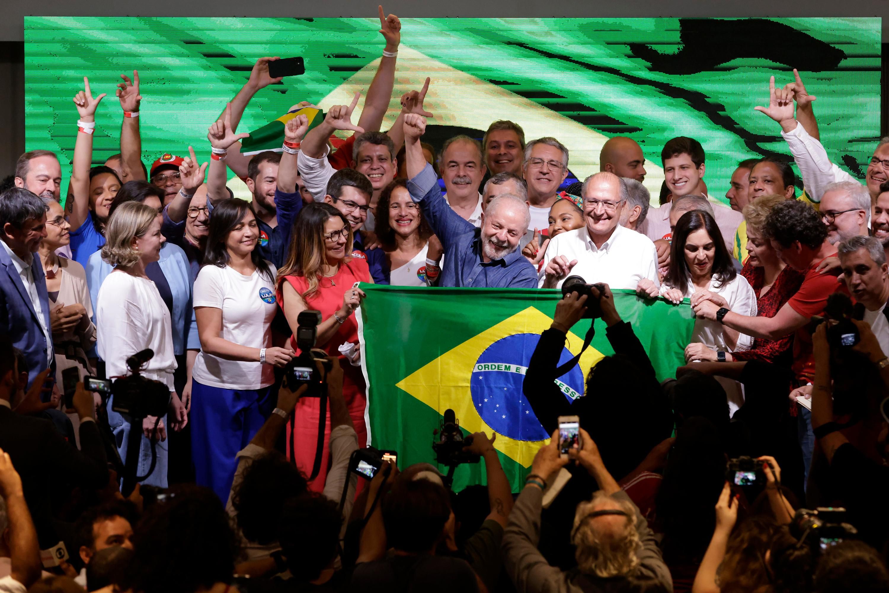 Lula celebrates with supporters after winning Brazil's presidential election