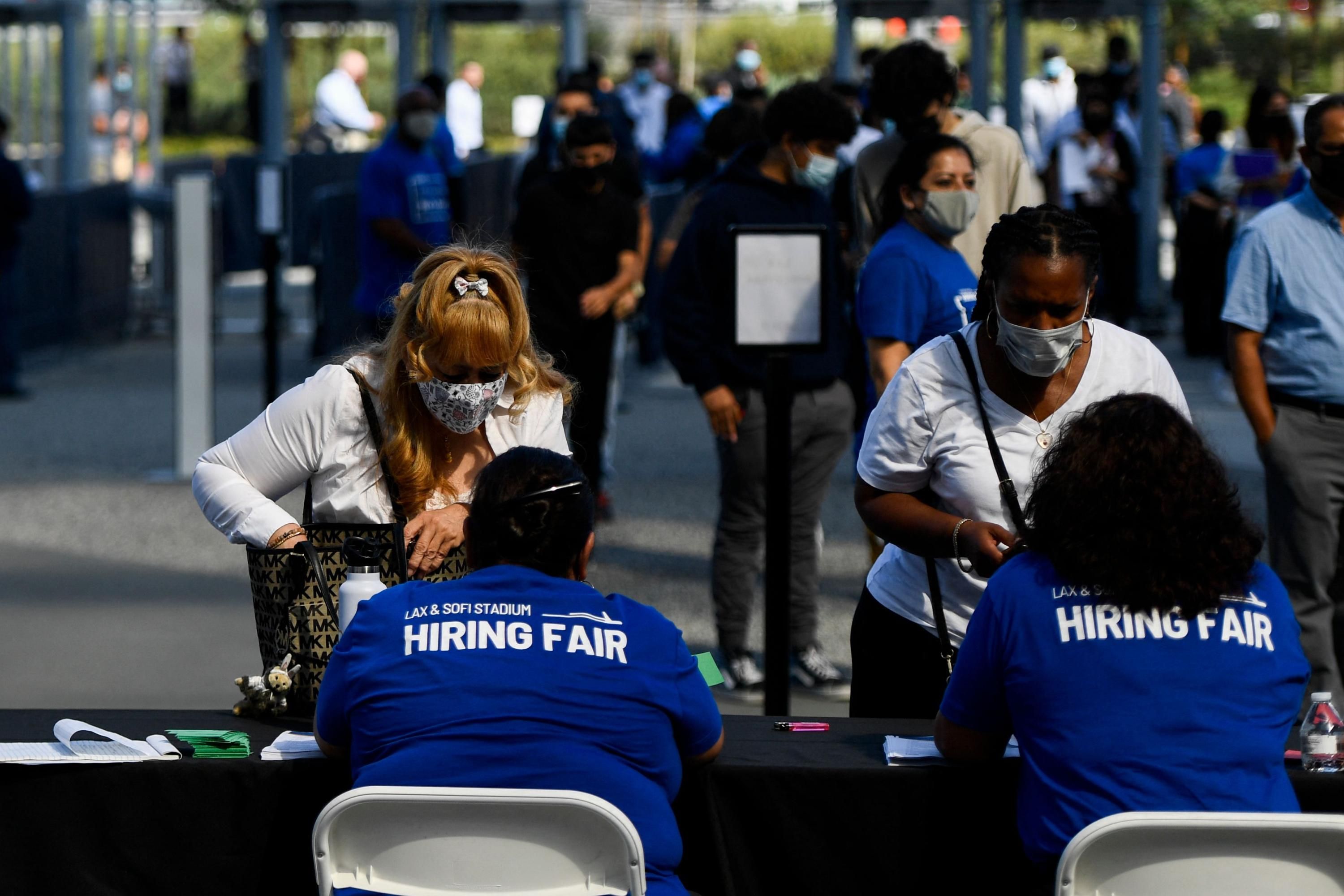 People attend a hiring fair in California