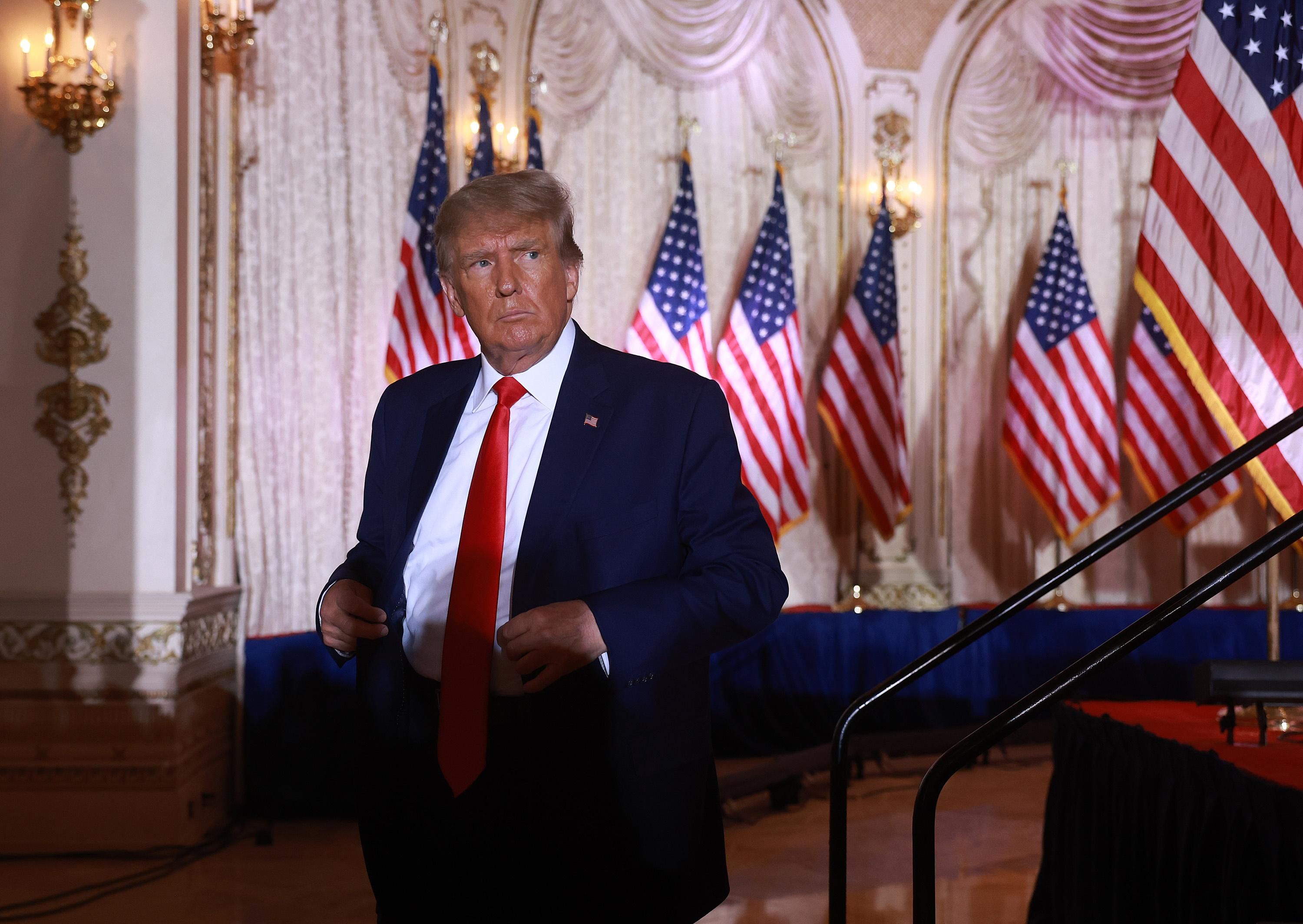 Former President Donald Trump leaves the stage after announcing his 2024 run