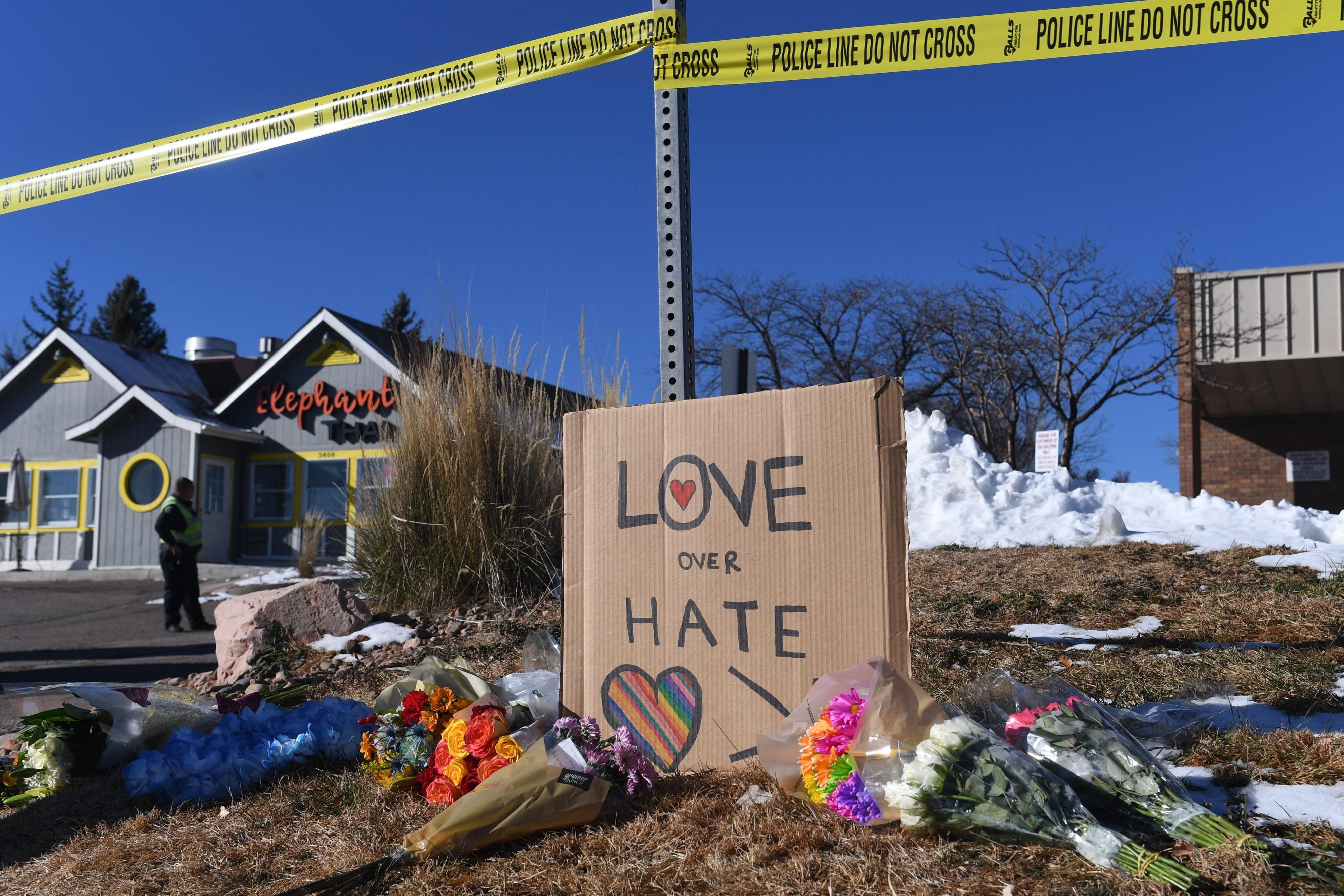 A sign reading "Love Over Hate" outside Club Q in Colorado Springs