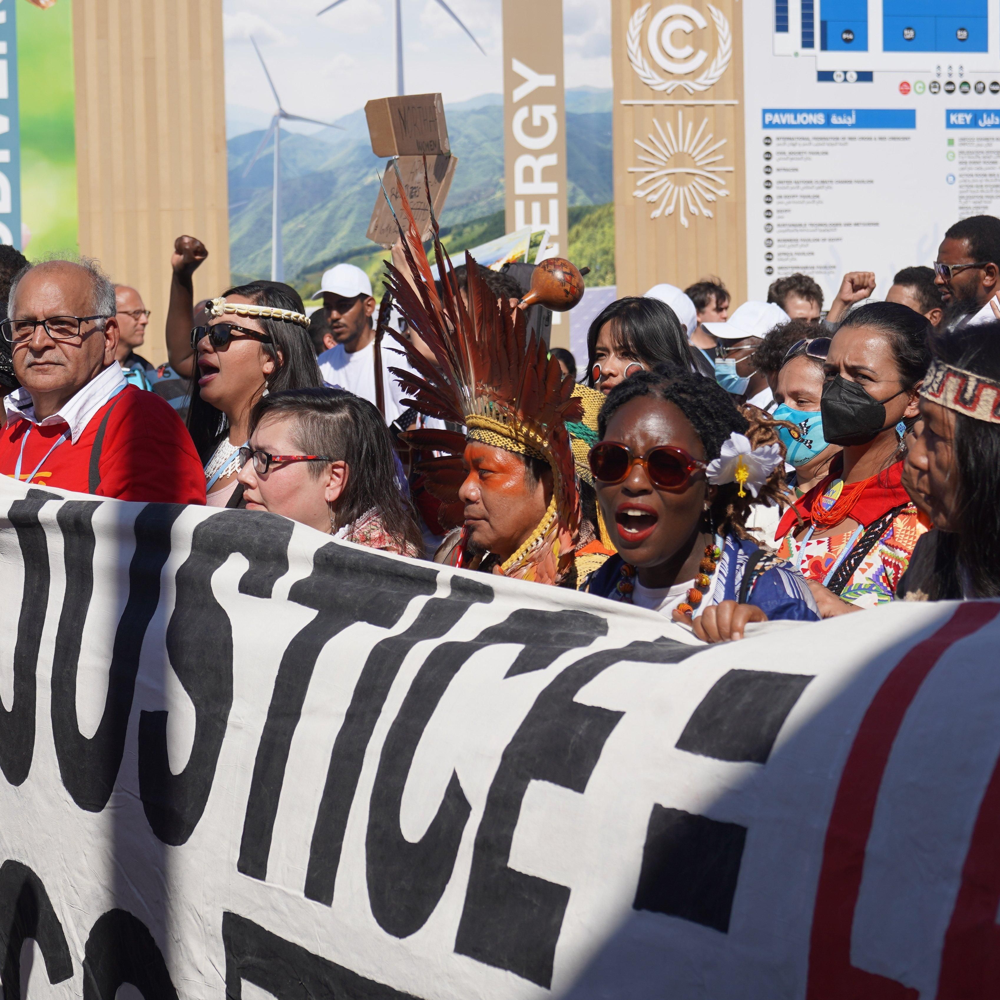 People participate in the Global Day of Action Climate Justice March at COP27 on November 12, 2022 in Sharm El-Sheikh, Egypt.