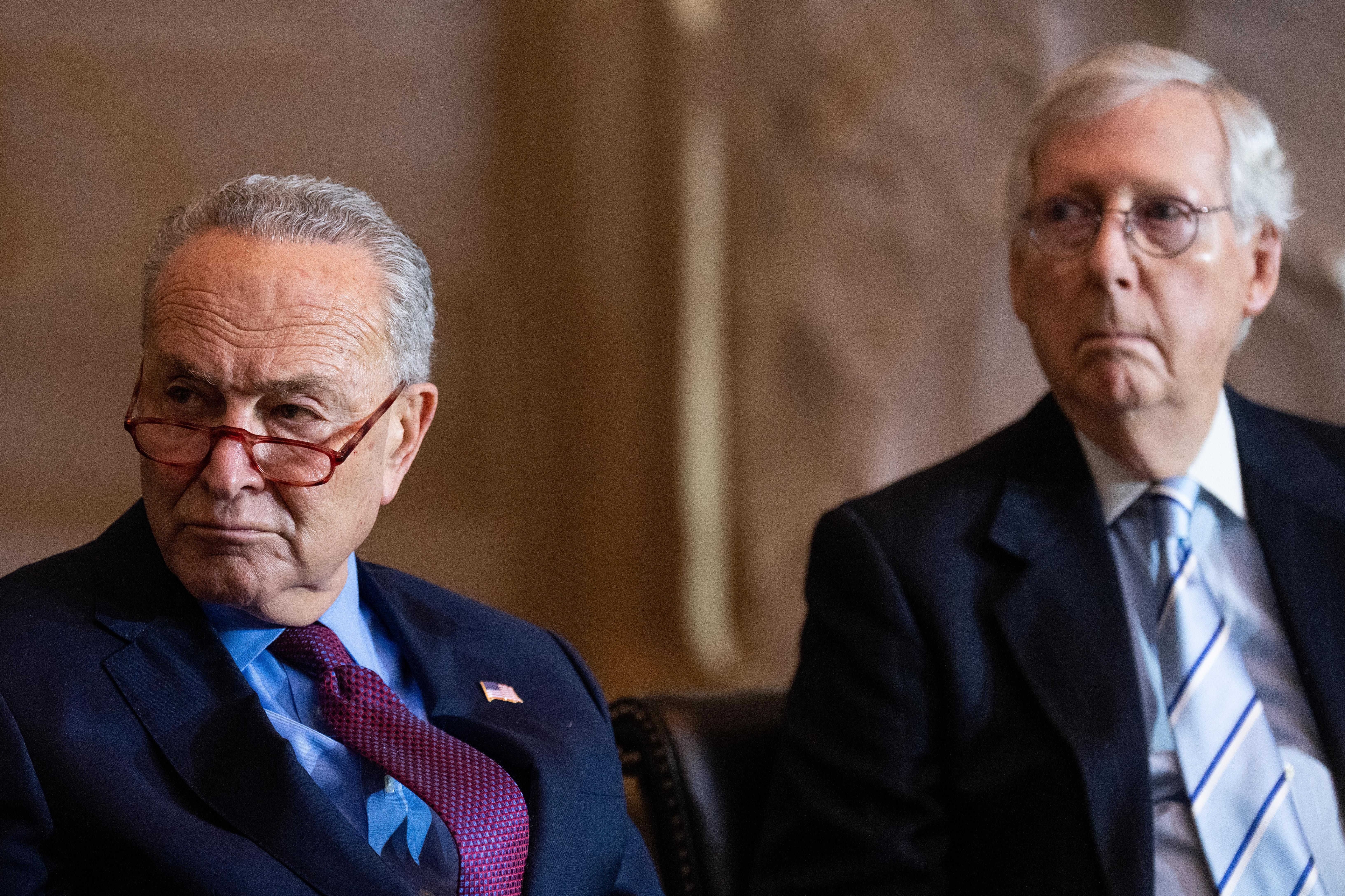 Senate Majority Leader Chuck Schumer (D-N.Y.) and Senate Minority Leader Mitch McConnell (R-Ky.) attend the Congressional Gold Medal Ceremony in the Capitol Rotunda on December 6, 2022.