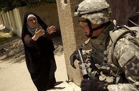 A woman speaks to a U.S. soldier in Baghdad, Iraq, June 26, 2007. (U.S. Army photo)