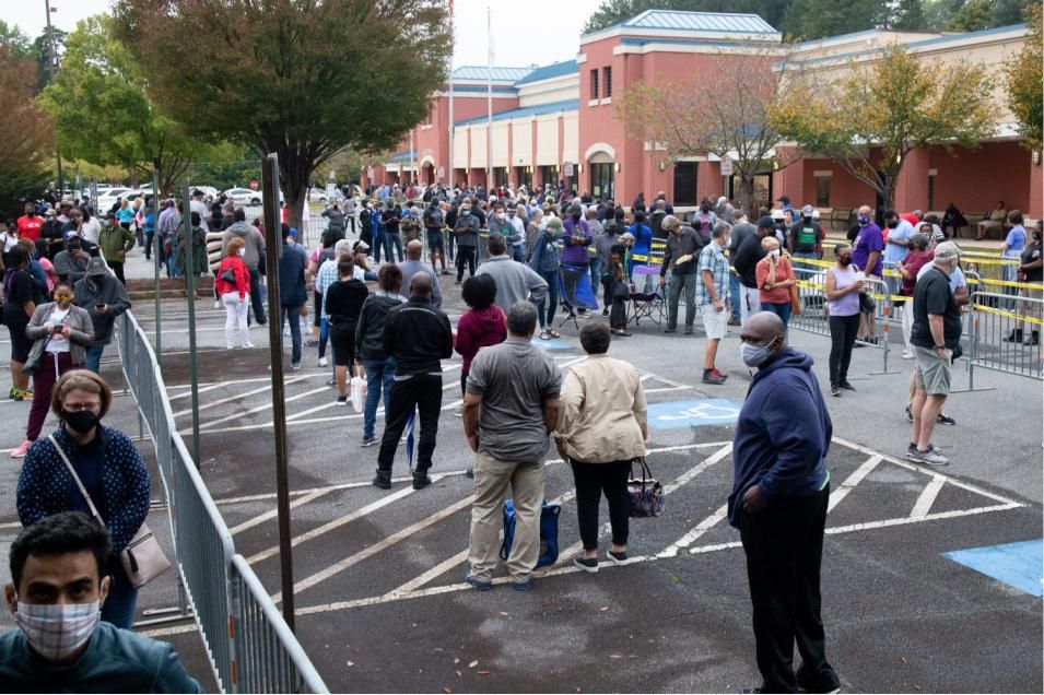 Long lines form outside the Cobb County Board of Elections in suburban Atlanta on the morning of October 12, 2020, the first day of in-person early voting. (Photo: Steve Schaefer/Atlanta Journal-Constitution)