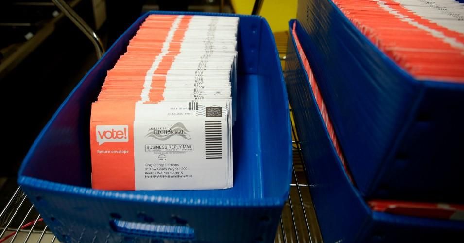 Vote-by-mail ballots for the August 4 Washington state primary are pictured at King County Elections in Renton, Washington on August 3, 2020. 