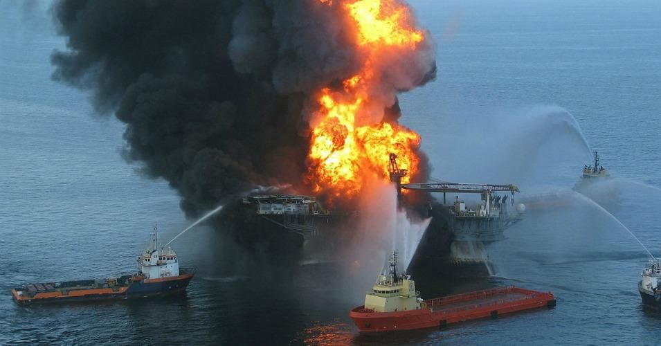 The U.S. Coast Guard battles flames following the explosion on BP's offshore oil rig Deepwater Horizon. (Photo: US Coast Guard/ Wikimedia Commons)
